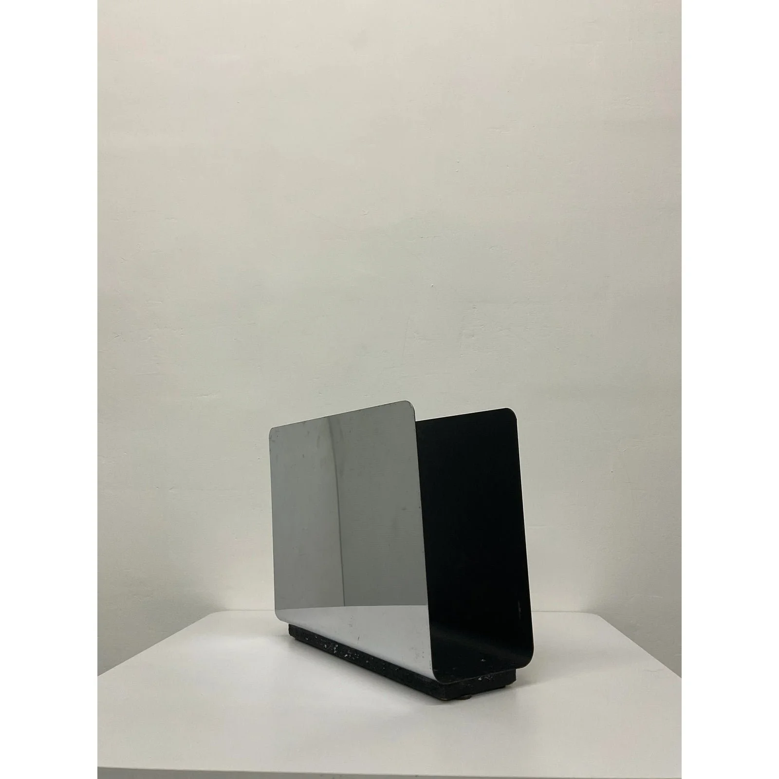 mid-century-modern-chrome-and-black-steel-magazine-rack-9454