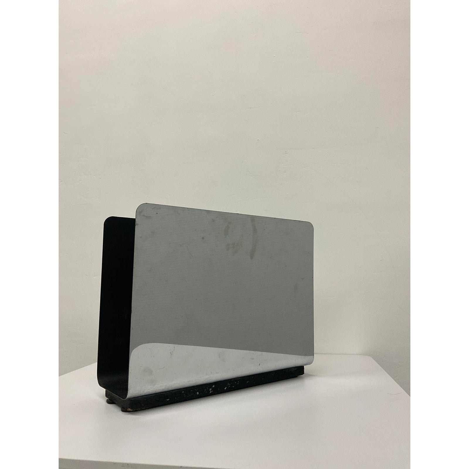 mid-century-modern-chrome-and-black-steel-magazine-rack-7254