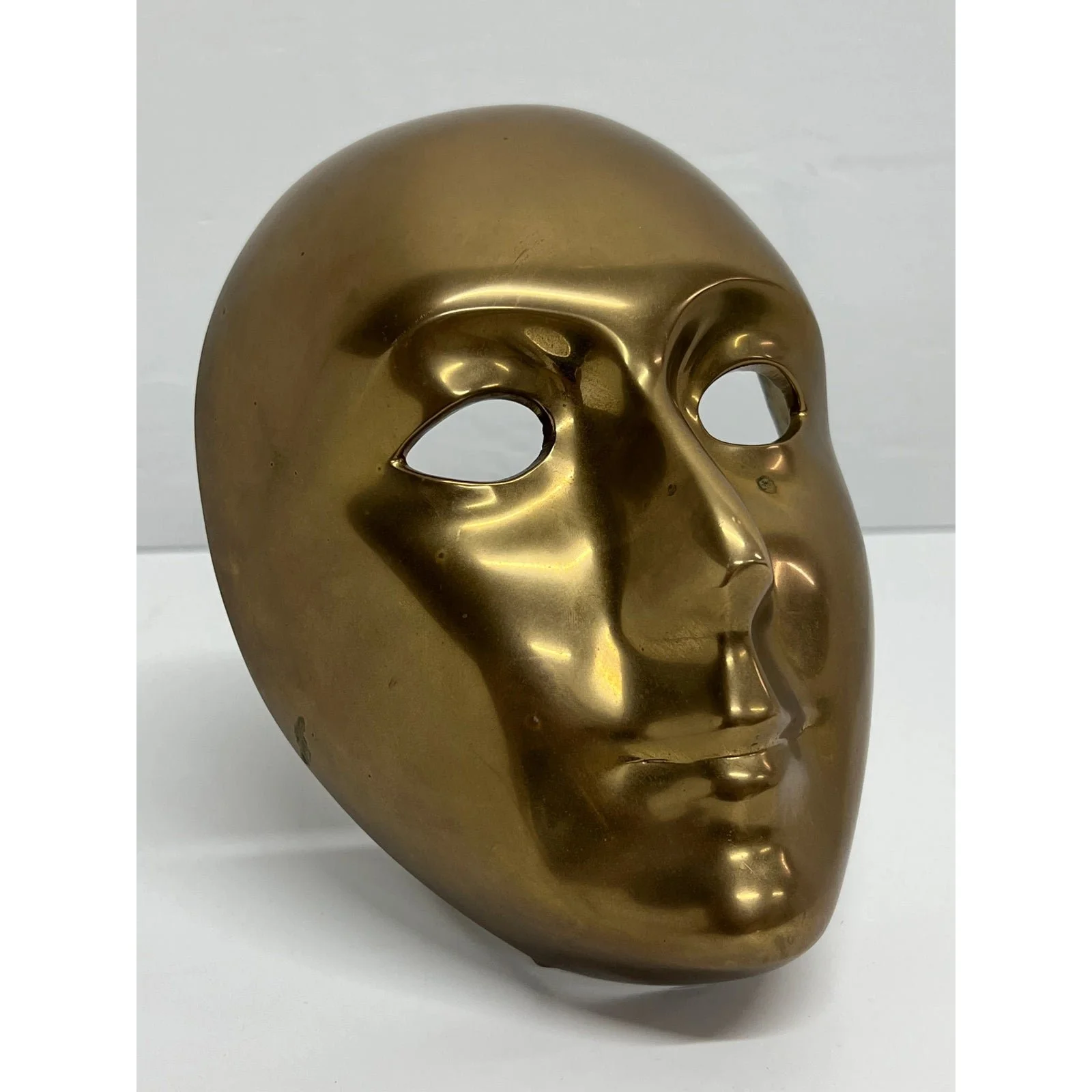 polished-bronze-venetian-mask-sculpture-by-volere-1994