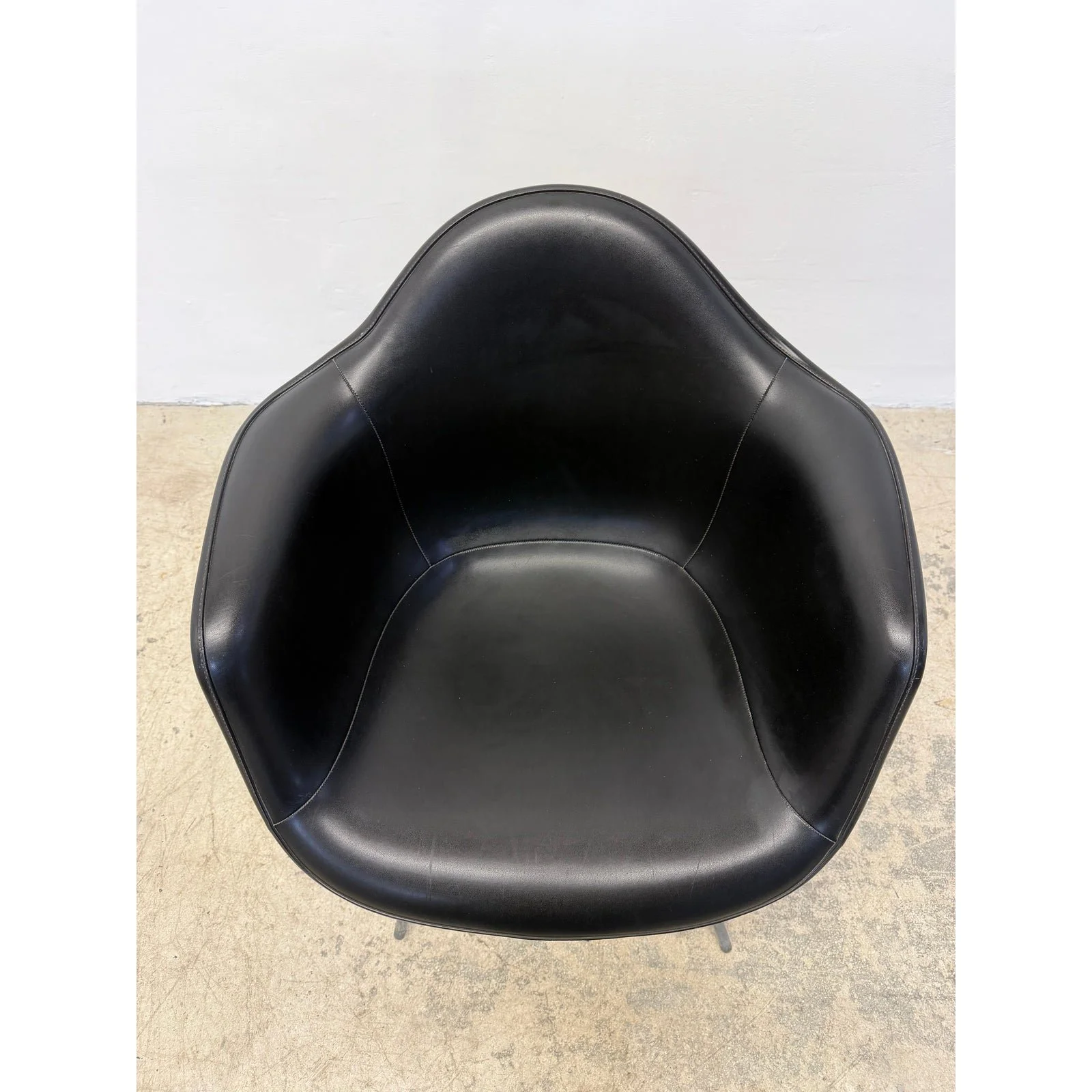 herman-miller-black-naugahyde-arm-chair-by-charles-and-ray-eames-1950