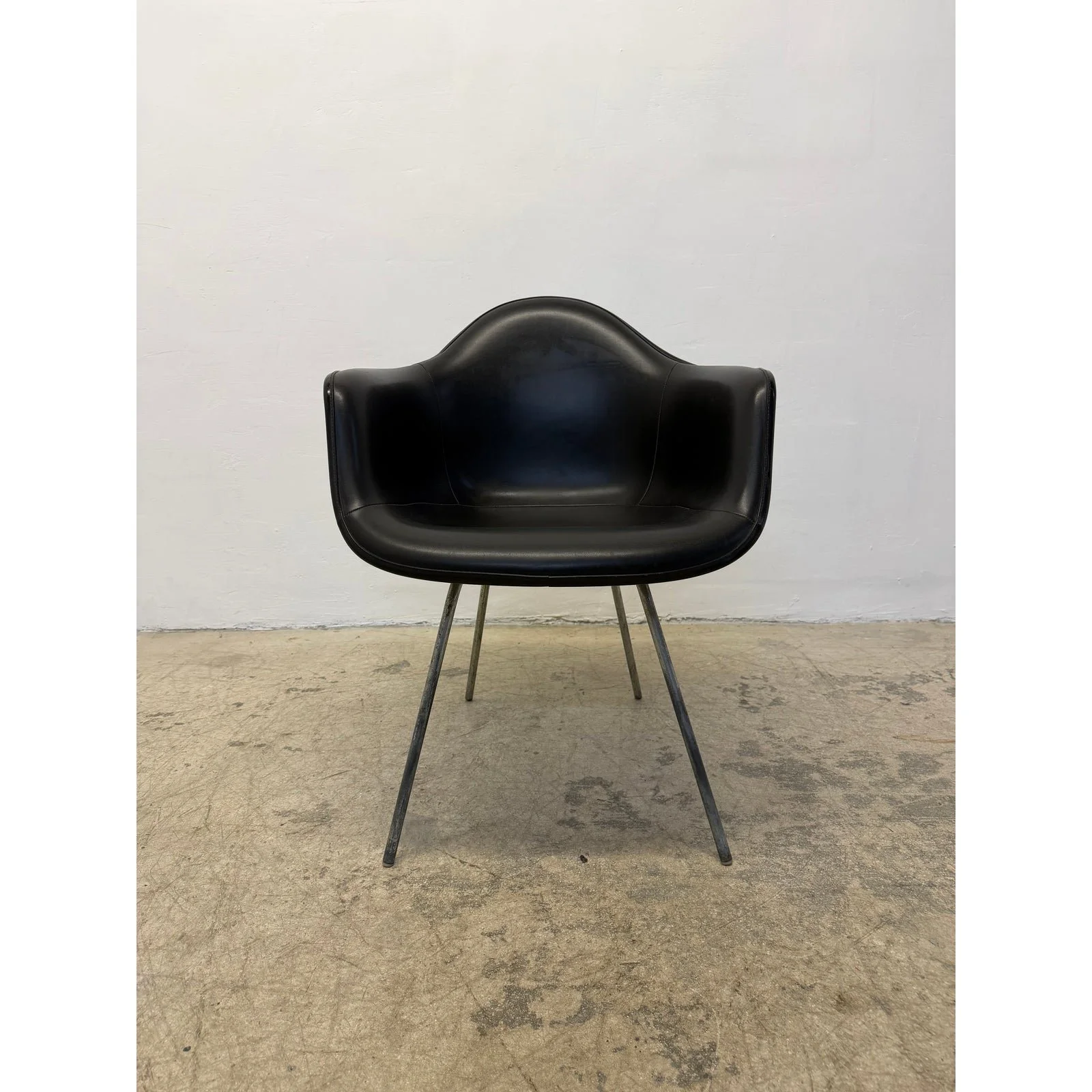 herman-miller-black-naugahyde-arm-chair-by-charles-and-ray-eames-1950