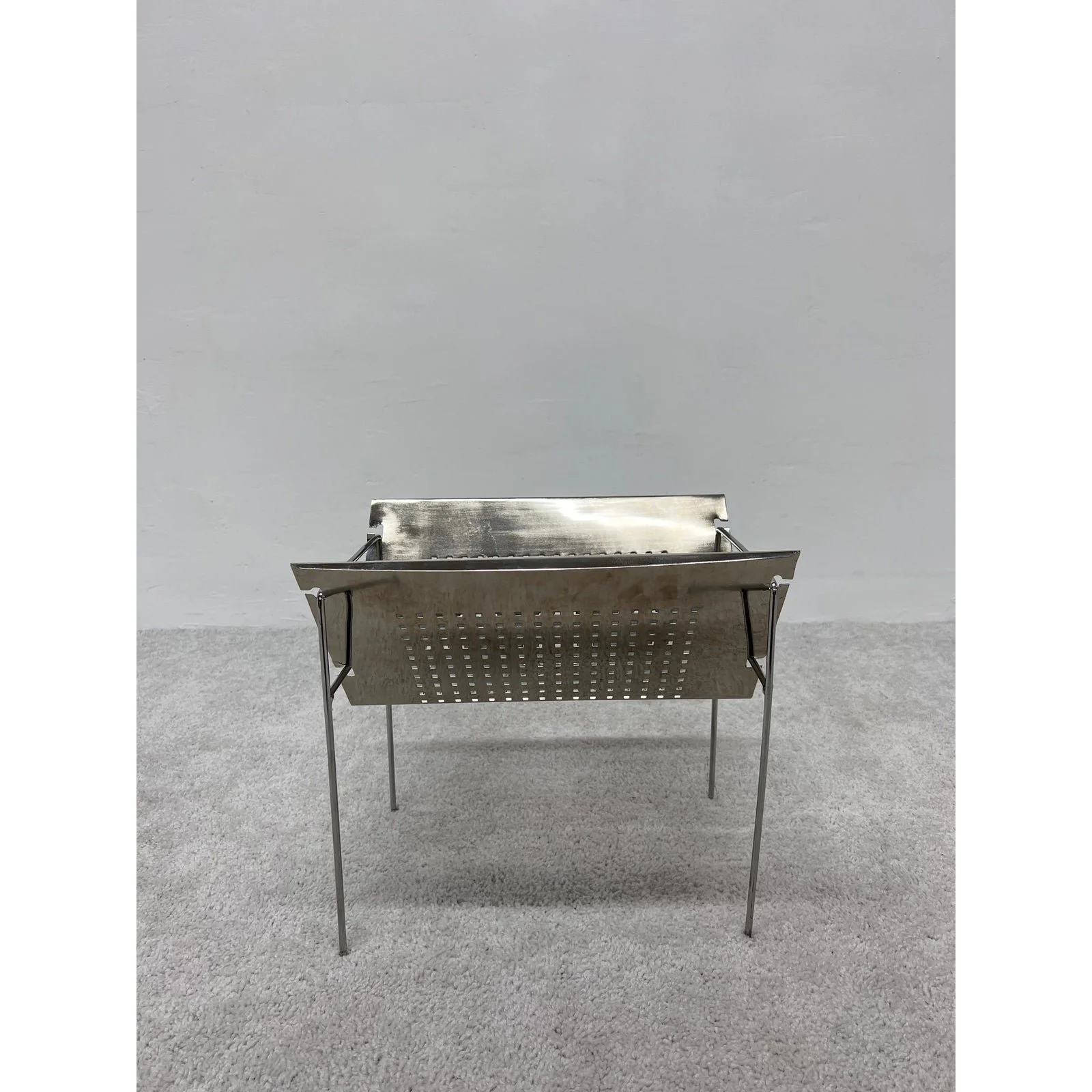 mid-century-brazilian-modern-perforated-chrome-magazine-rack-1960s-0189
