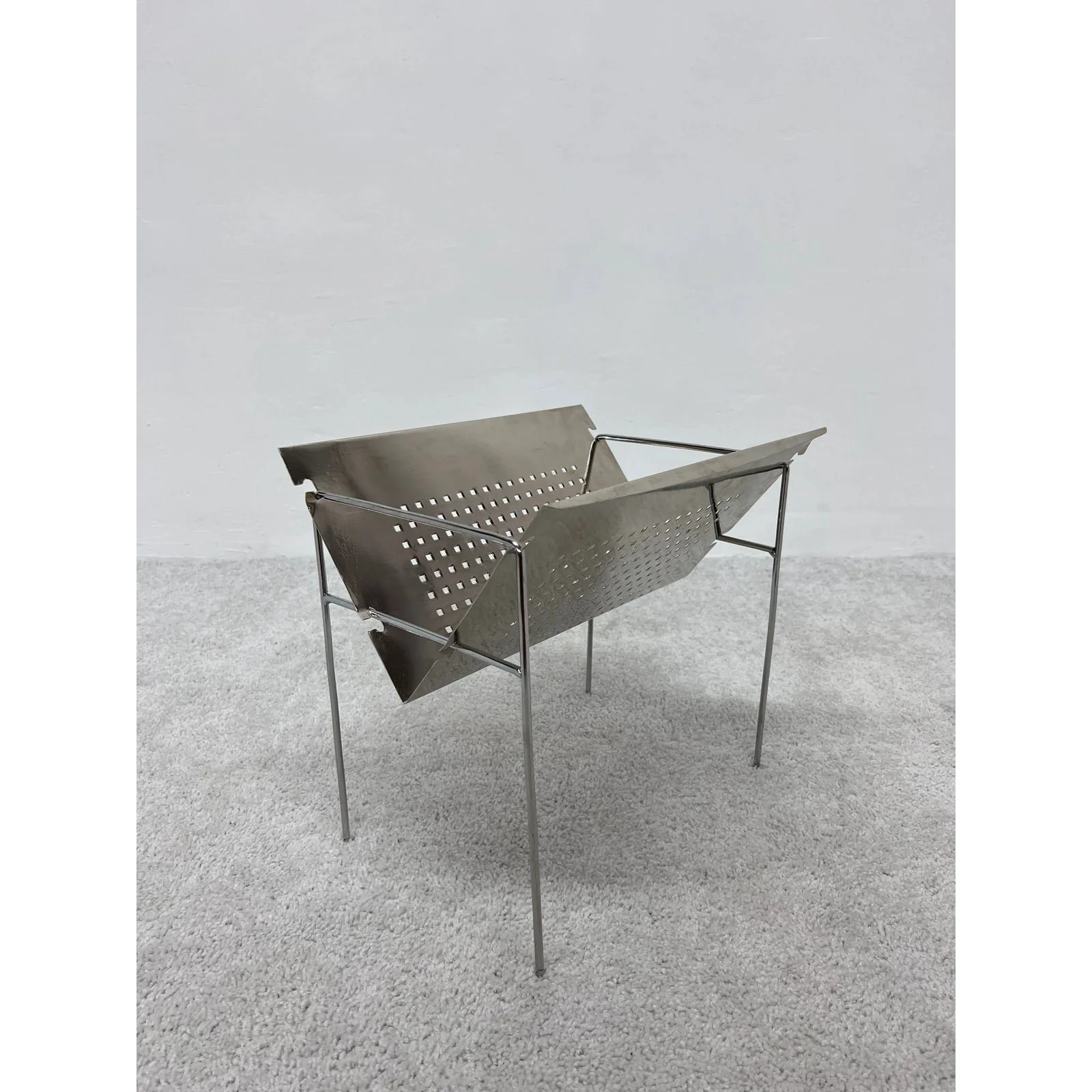 mid-century-brazilian-modern-perforated-chrome-magazine-rack-1960s-7041
