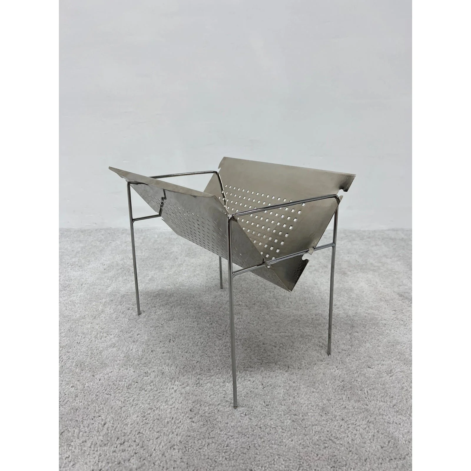 mid-century-brazilian-modern-perforated-chrome-magazine-rack-1960s-4381