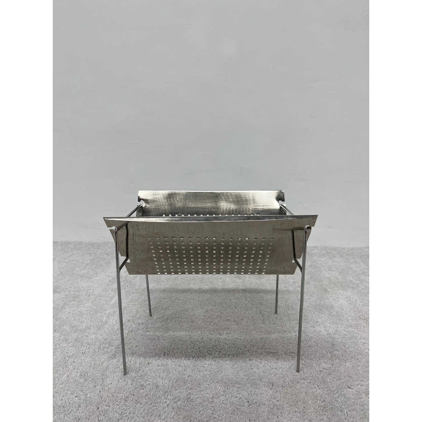 mid-century-brazilian-modern-perforated-chrome-magazine-rack-1960s-1721