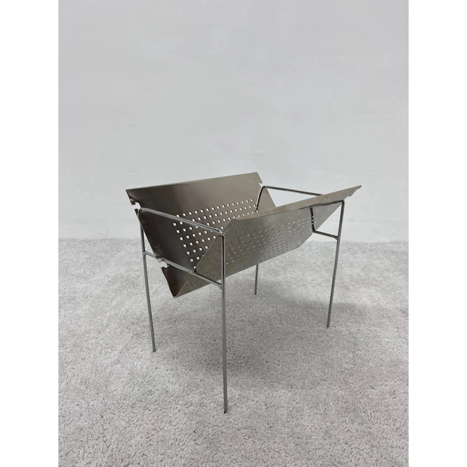 mid-century-brazilian-modern-perforated-chrome-magazine-rack-1960s-5250
