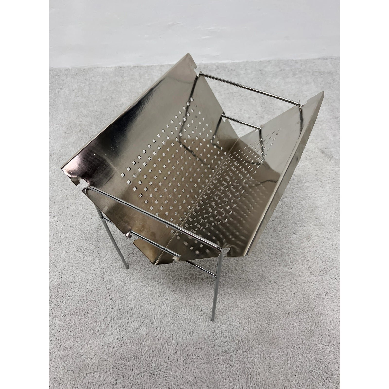 mid-century-brazilian-modern-perforated-chrome-magazine-rack-1960s-2155
