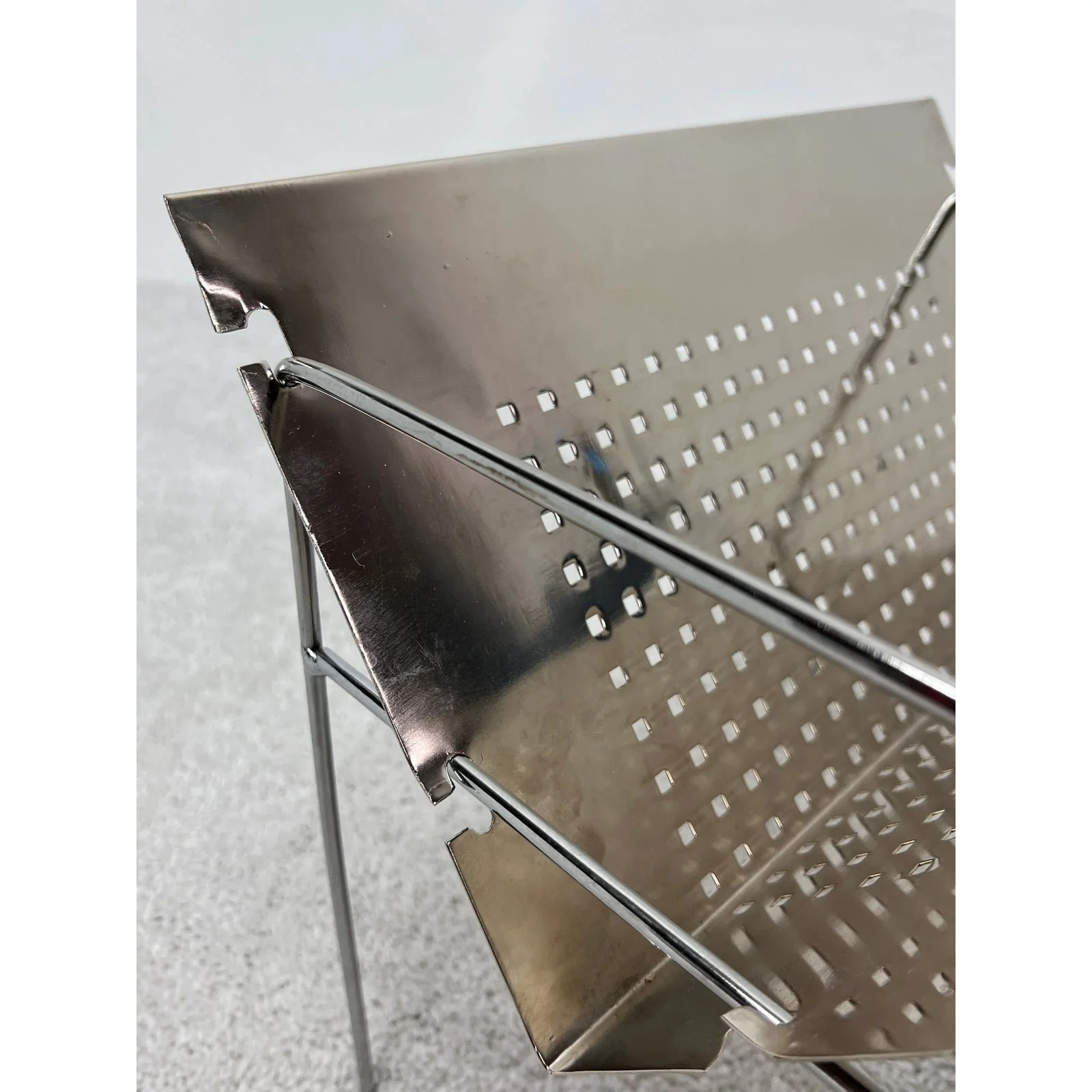mid-century-brazilian-modern-perforated-chrome-magazine-rack-1960s-9966