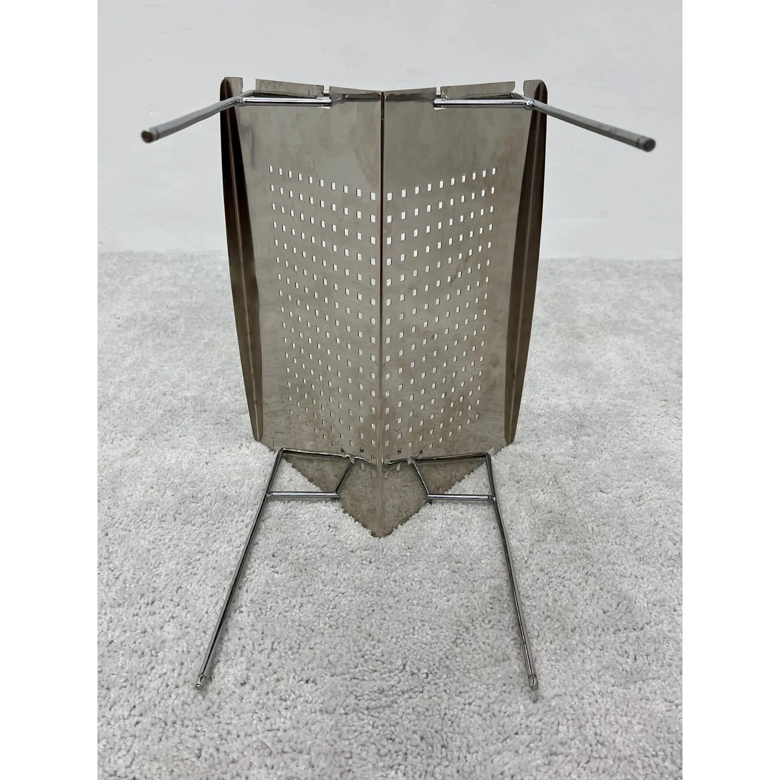 mid-century-brazilian-modern-perforated-chrome-magazine-rack-1960