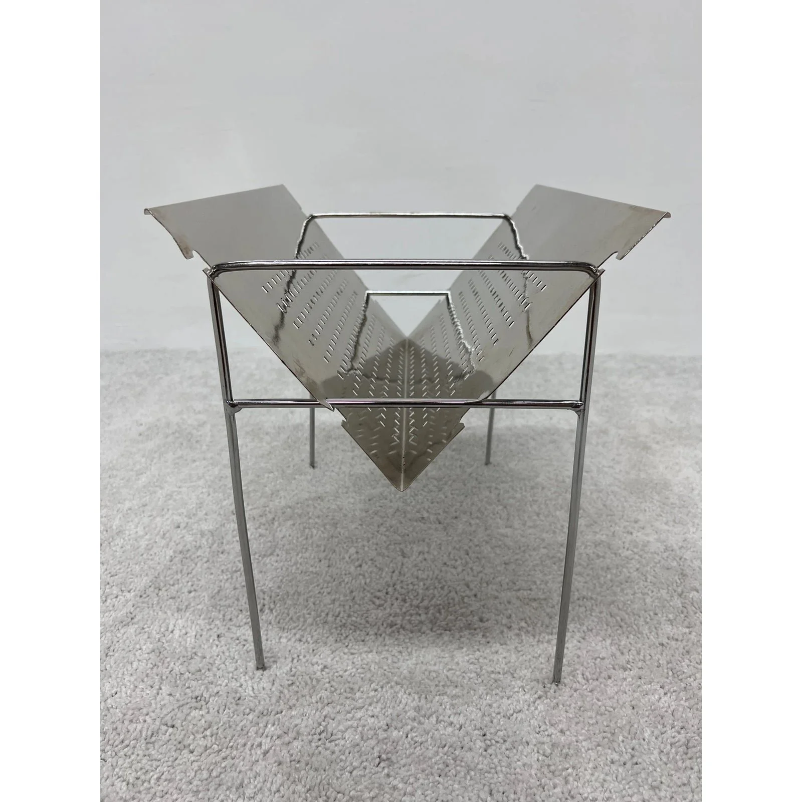 mid-century-brazilian-modern-perforated-chrome-magazine-rack-1960