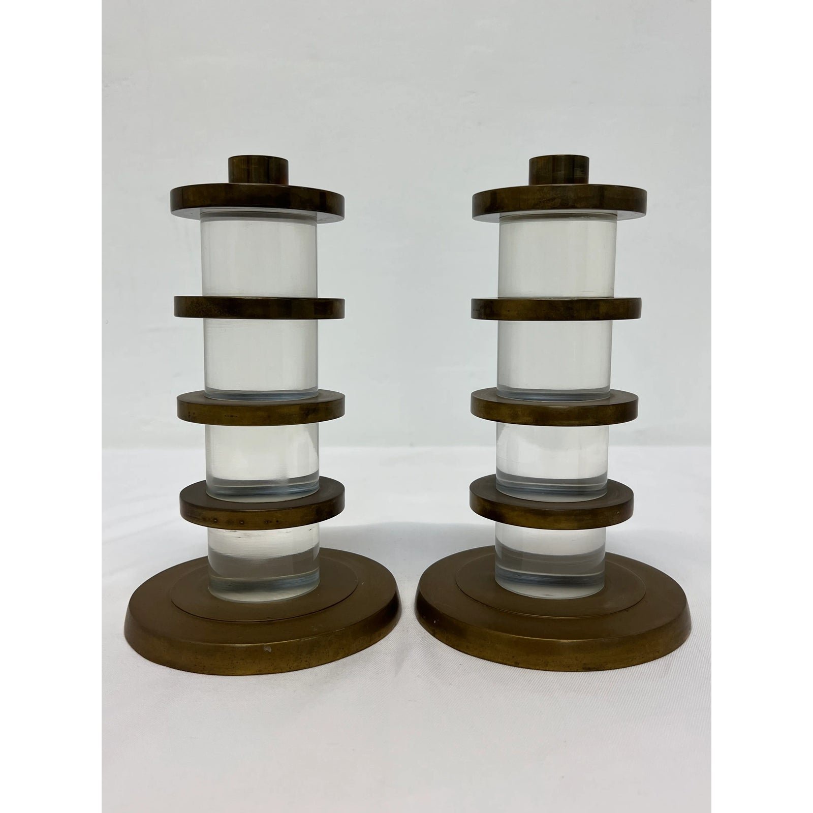 dolbi-cashier-lucite-and-brass-candle-holders-1987