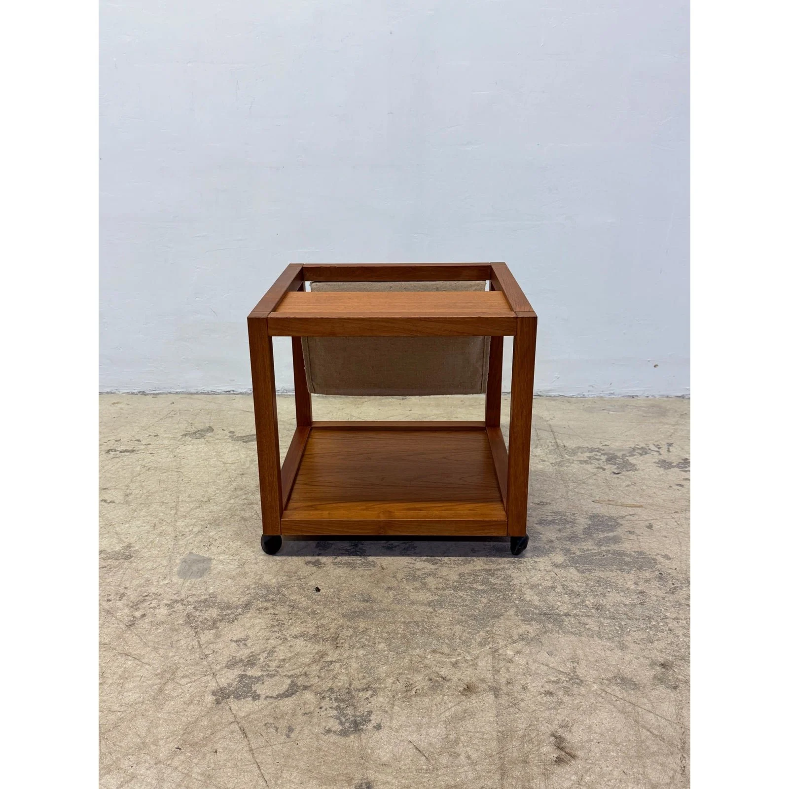 mid-century-danish-modern-teak-wood-rolling-end-table-with-magazine-or-book-holder-7310