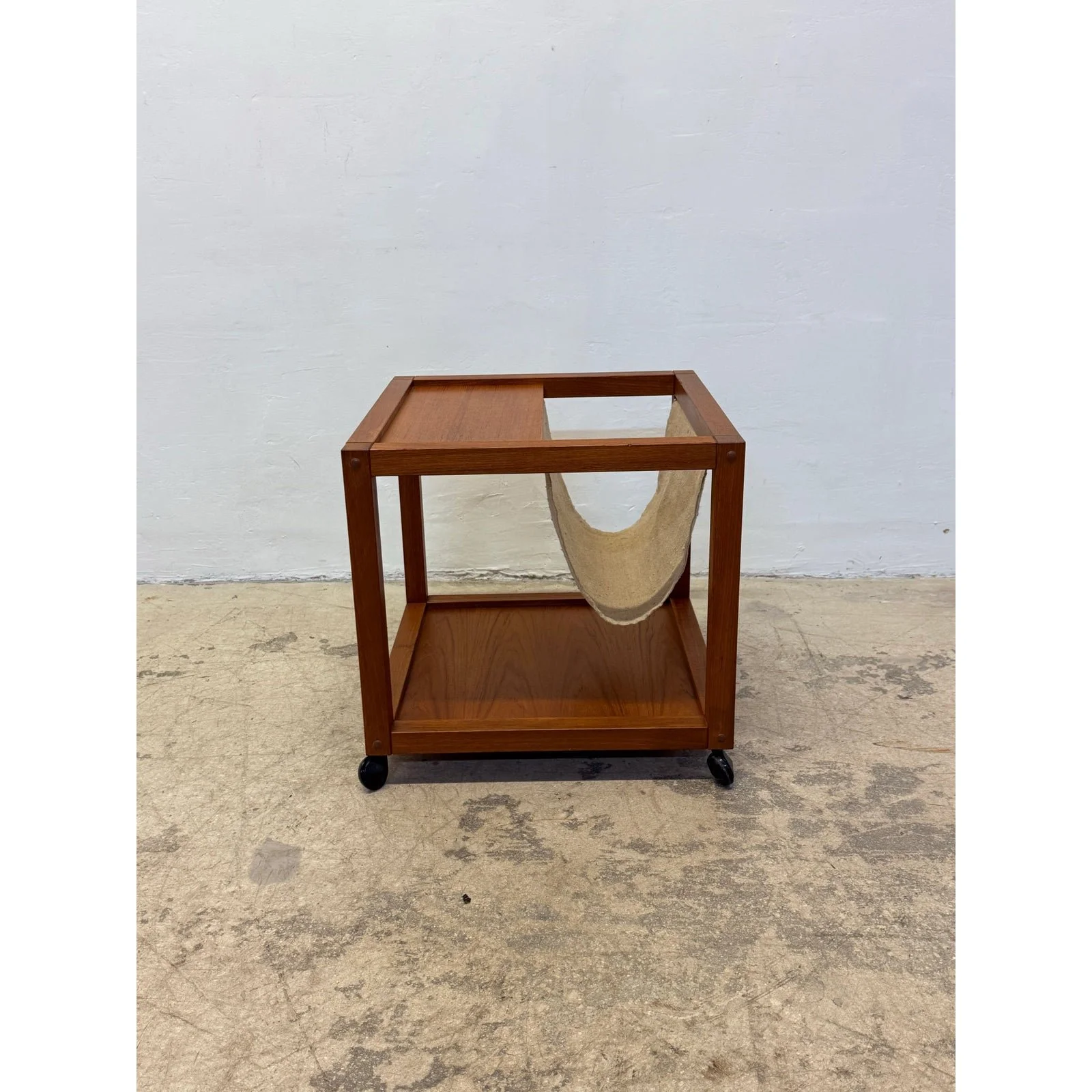 mid-century-danish-modern-teak-wood-rolling-end-table-with-magazine-or-book-holder-0172
