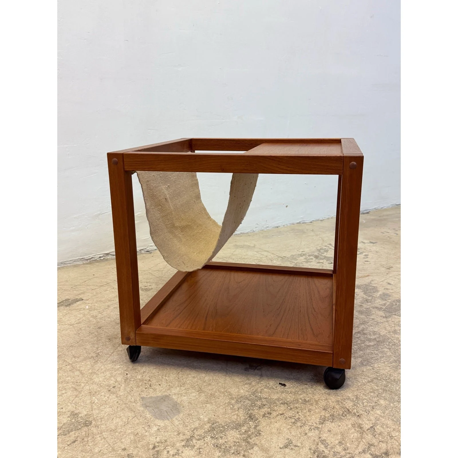 mid-century-danish-modern-teak-wood-rolling-end-table-with-magazine-or-book-holder-0359