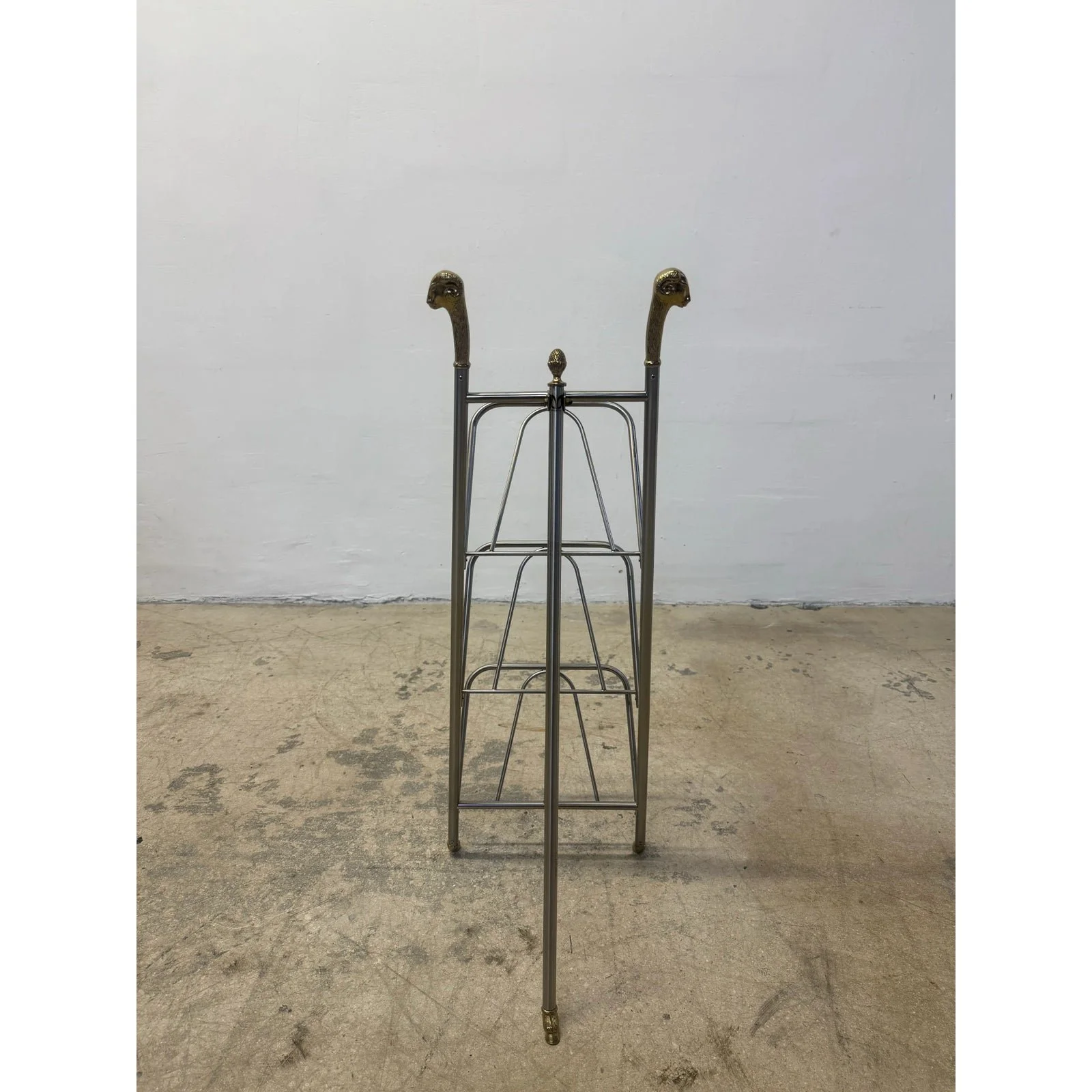 maison-jansen-style-steel-and-brass-rams-head-and-feet-magazine-rack-italy-3476