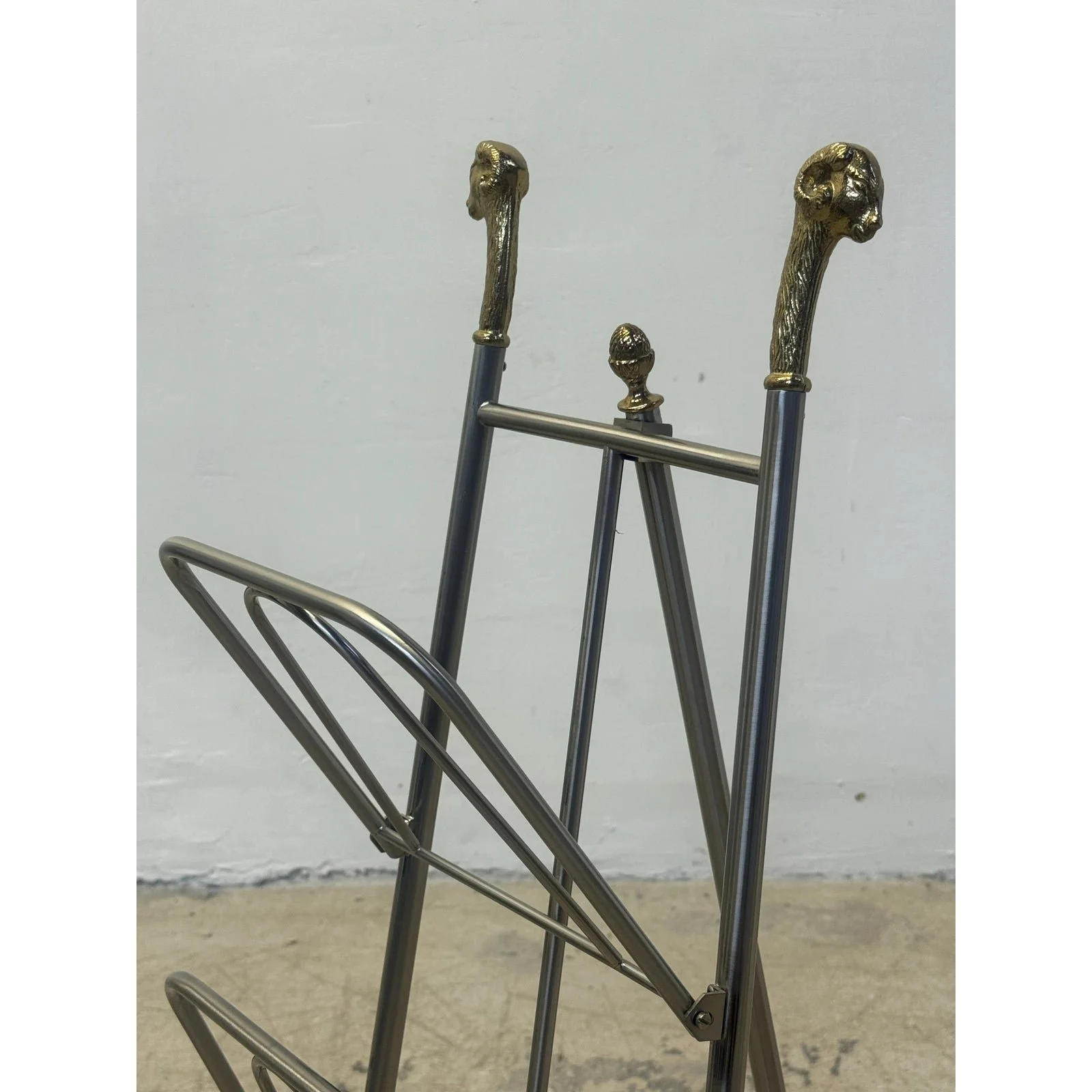 maison-jansen-style-steel-and-brass-rams-head-and-feet-magazine-rack-italy-9769