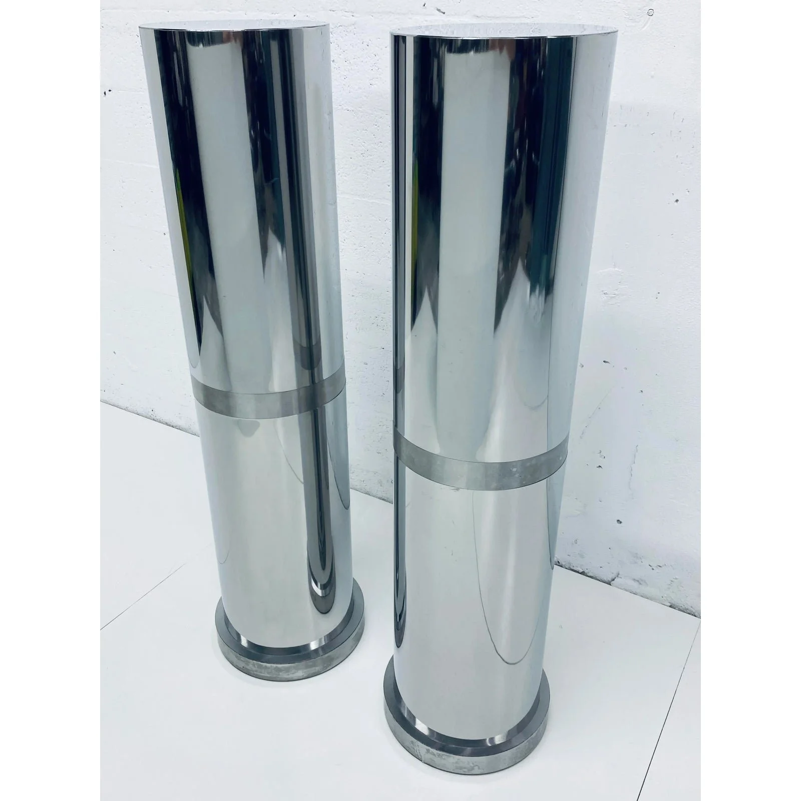 polished-steel-tall-circular-pedestal-tables-with-brushed-steel-banding-a-pair-3132
