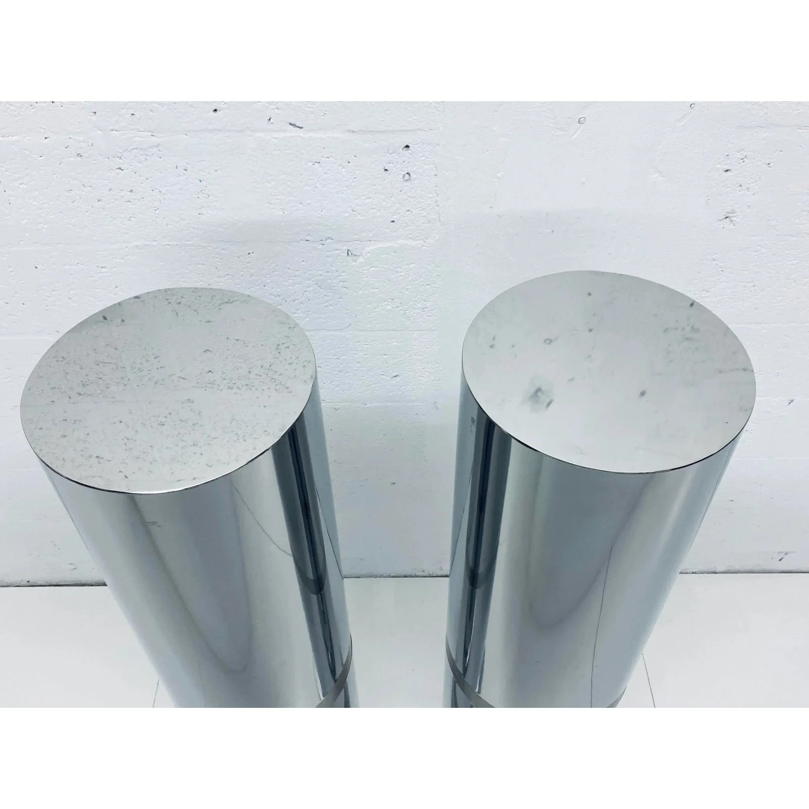 polished-steel-tall-circular-pedestal-tables-with-brushed-steel-banding-a-pair-0467