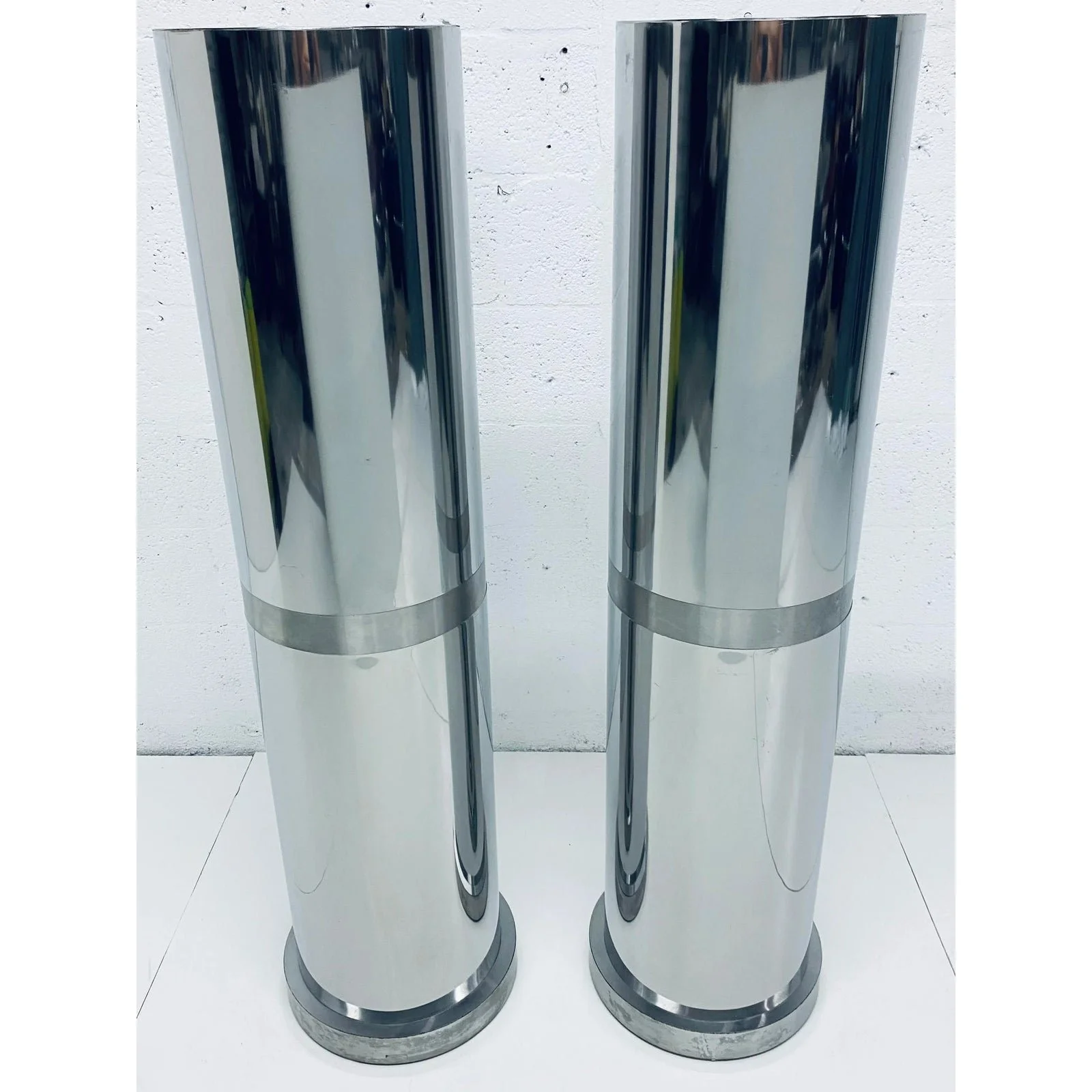 polished-steel-tall-circular-pedestal-tables-with-brushed-steel-banding-a-pair-1114