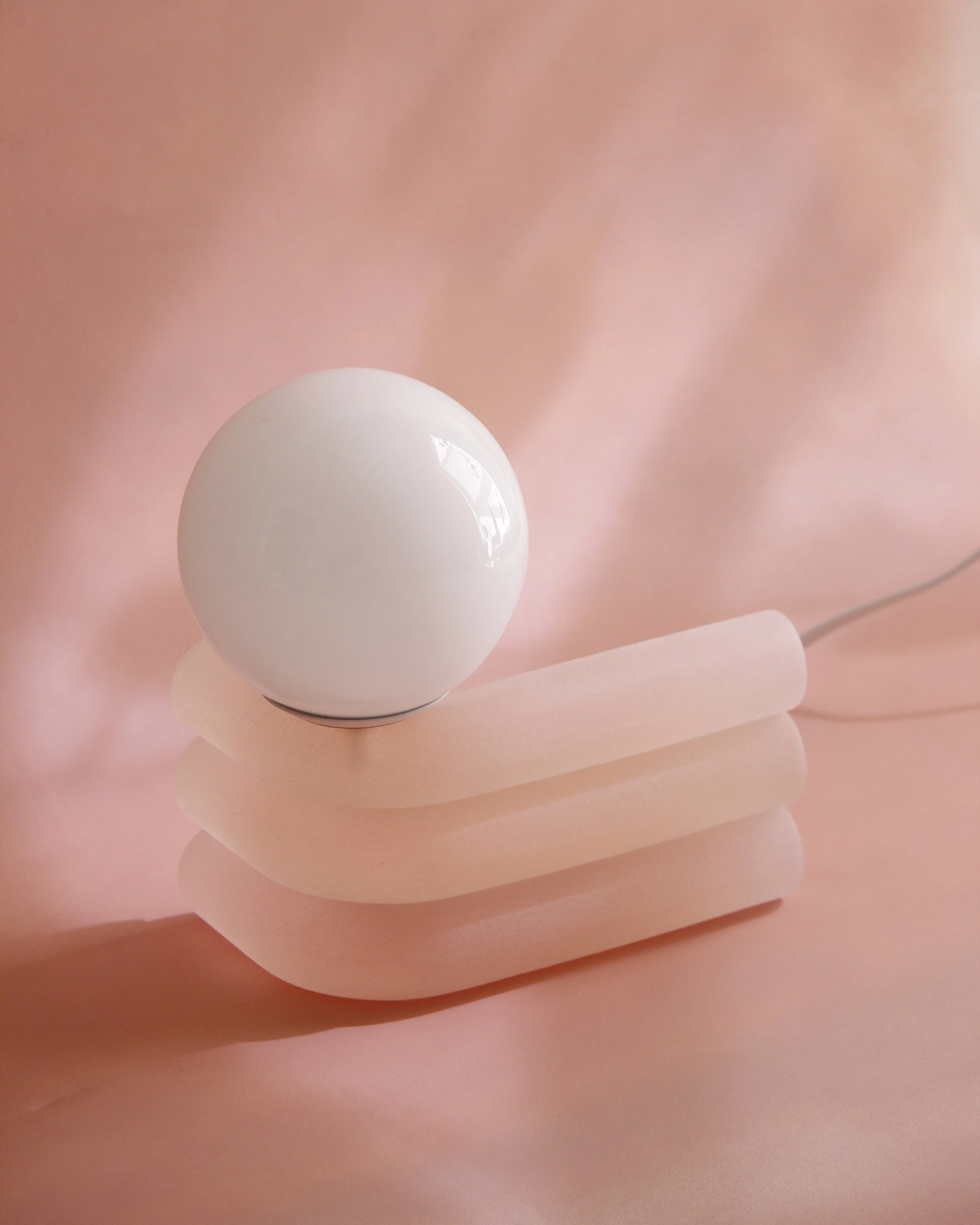 Hand-cast resin lamp with textured finish Artisanal resin lamp craftsmanship Unique textured resin table lamp