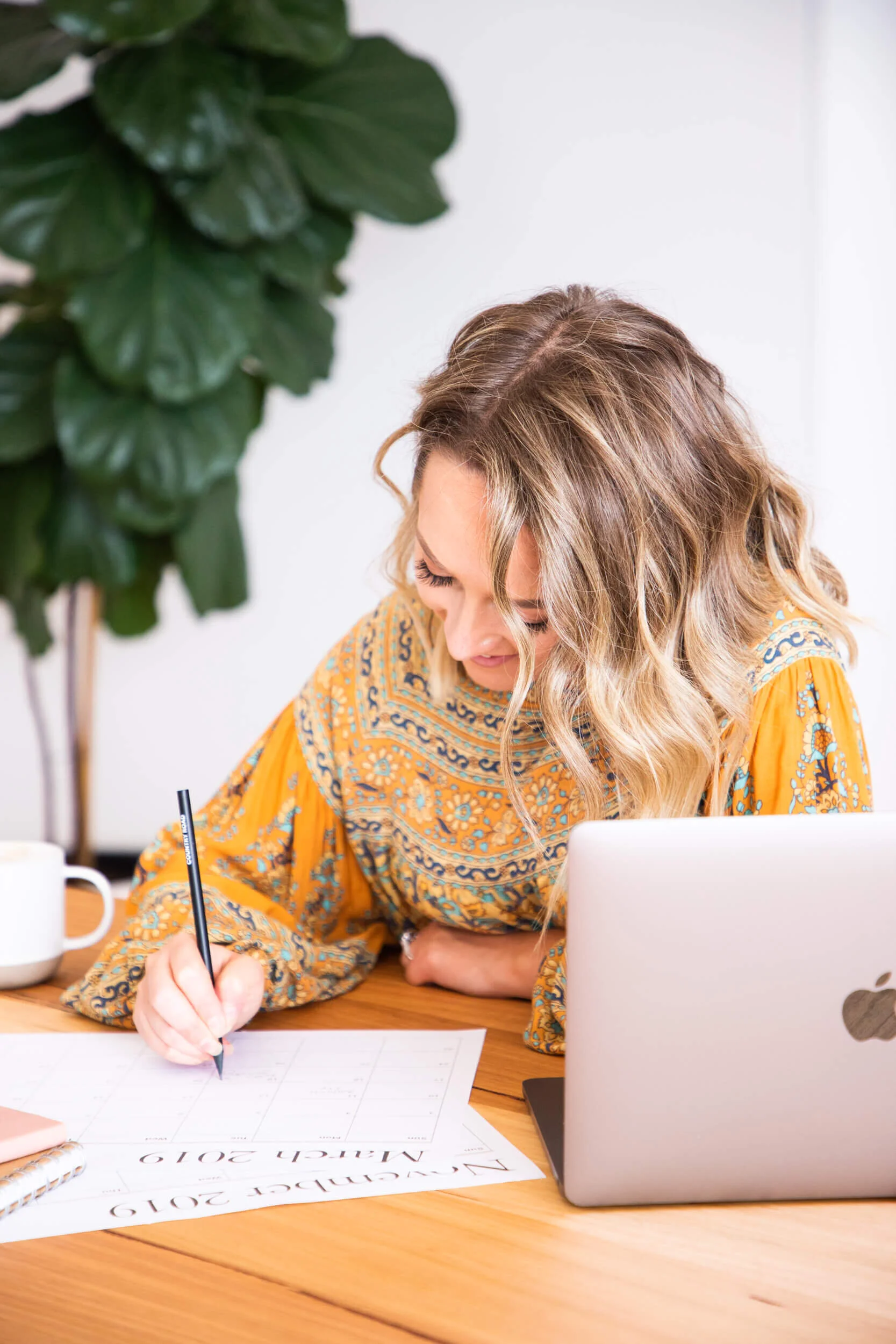 Lauren writing at desk.jpg