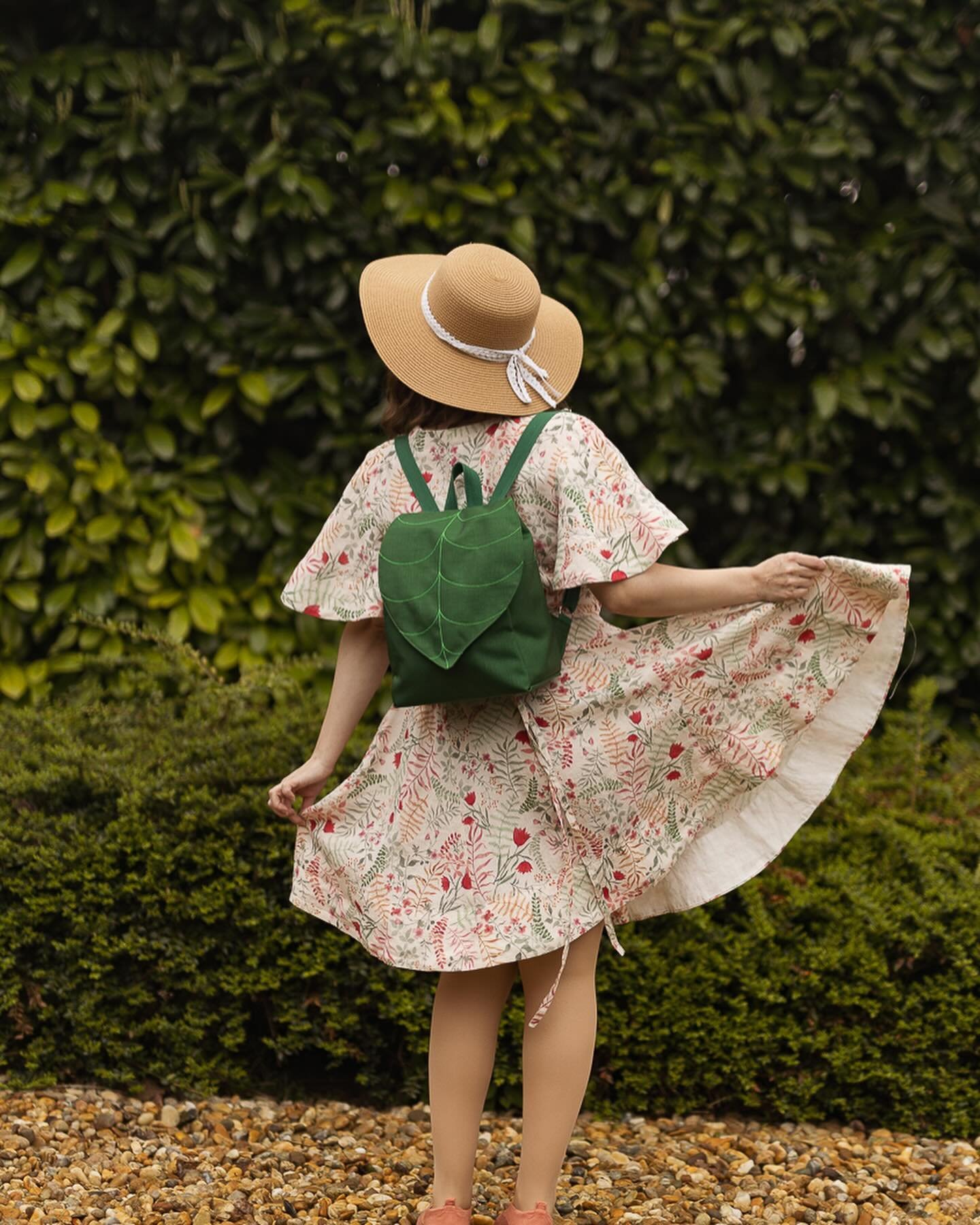 Ready for the summer weather. Wearing my favorite wrap dress from @sondeflor with my favorite green leaf backpack. This is one of the backpack designs that will be available in our next shop update.
