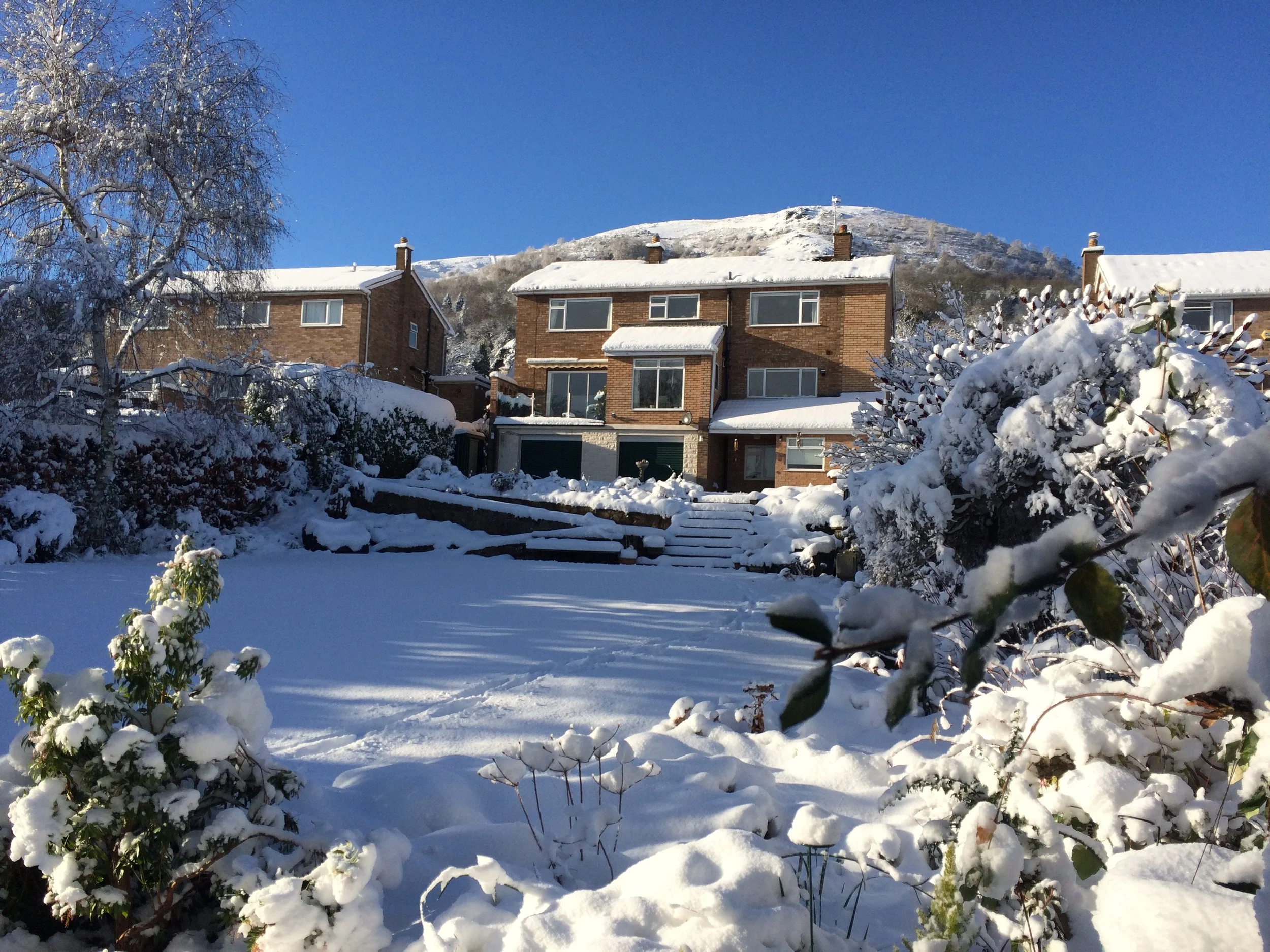 House in Winter with the Hills behind
