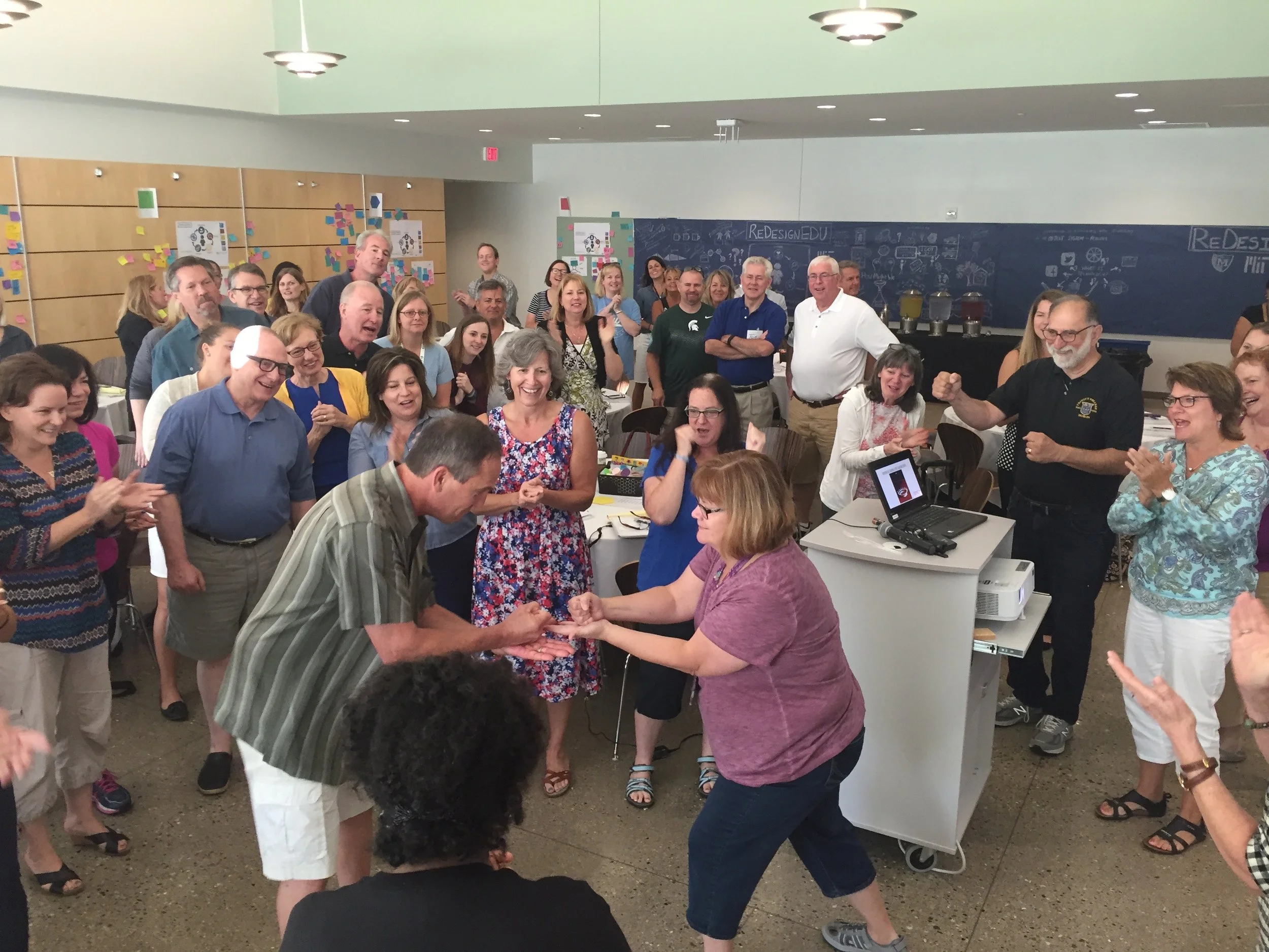 Check out past participants in the midst of a design thinking challenge. Do you know this game? Could you win?