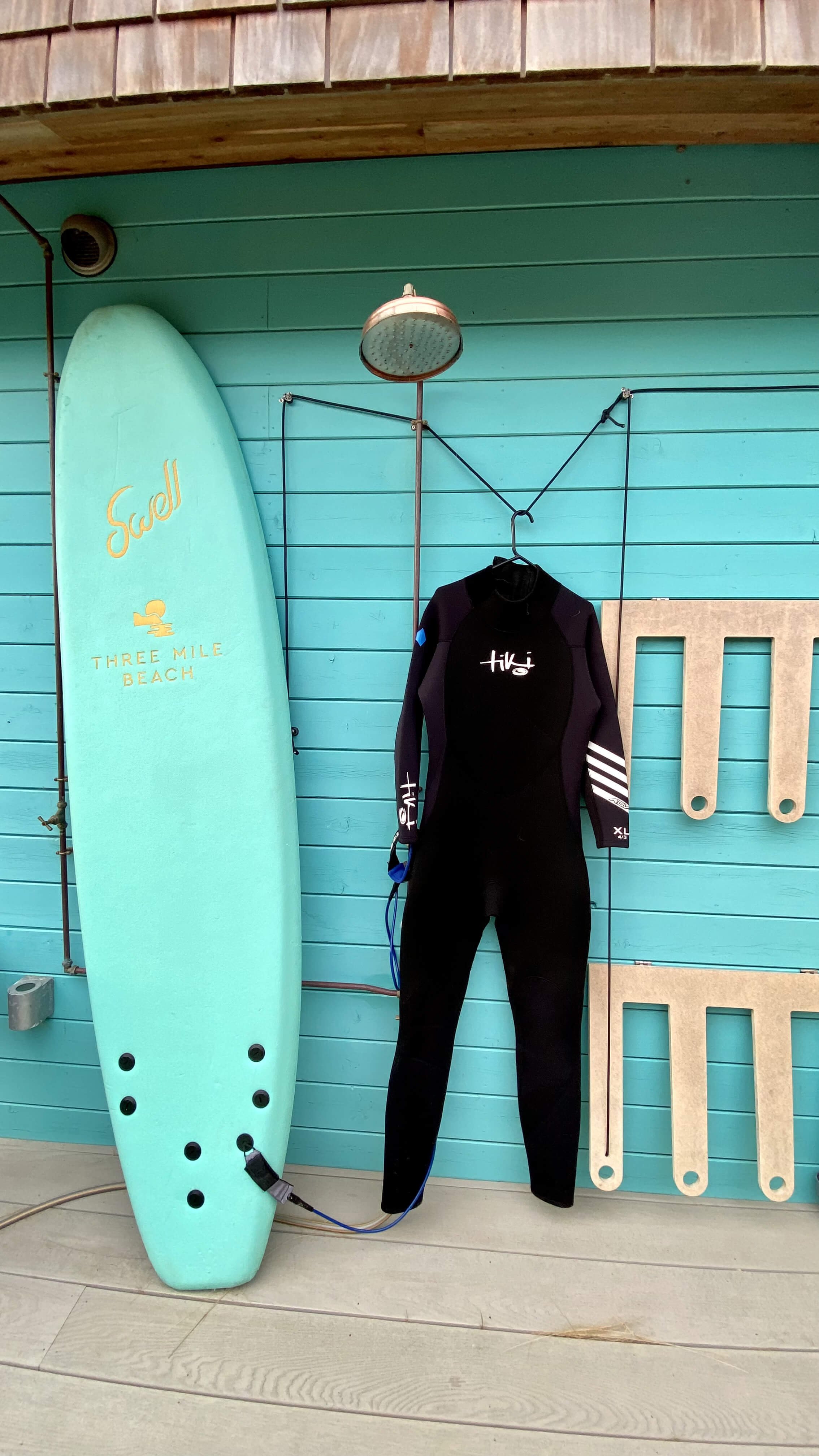 three mile beach surf board and wet suit.jpg