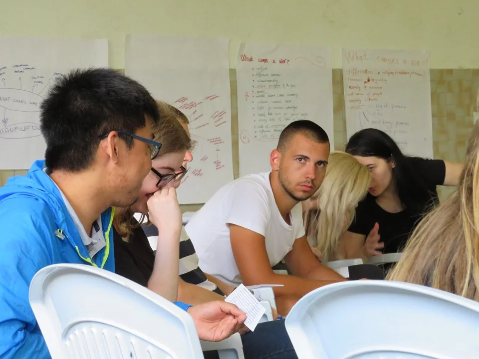 Participants discuss scenarios during simulation exercise. Photo: Dijana Rakovic