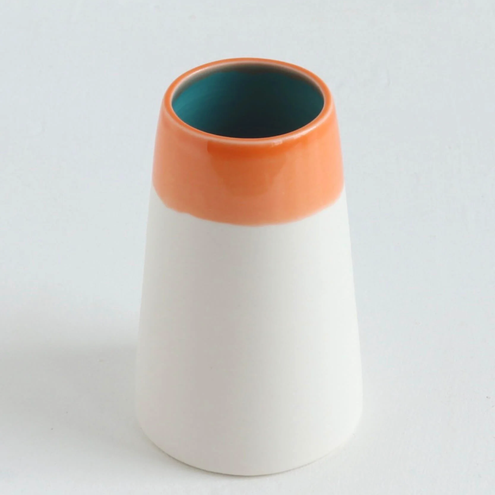 Hibiscus-orange-porcelain-bud-vase-3-penny-spooner-ceramics.png