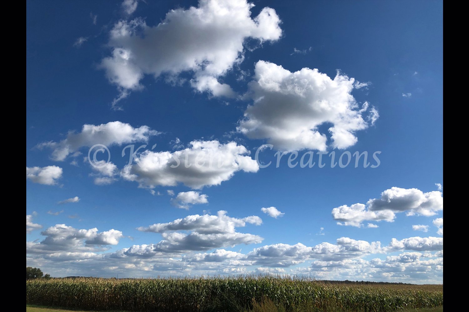 clouds-over-field-2x3.jpg