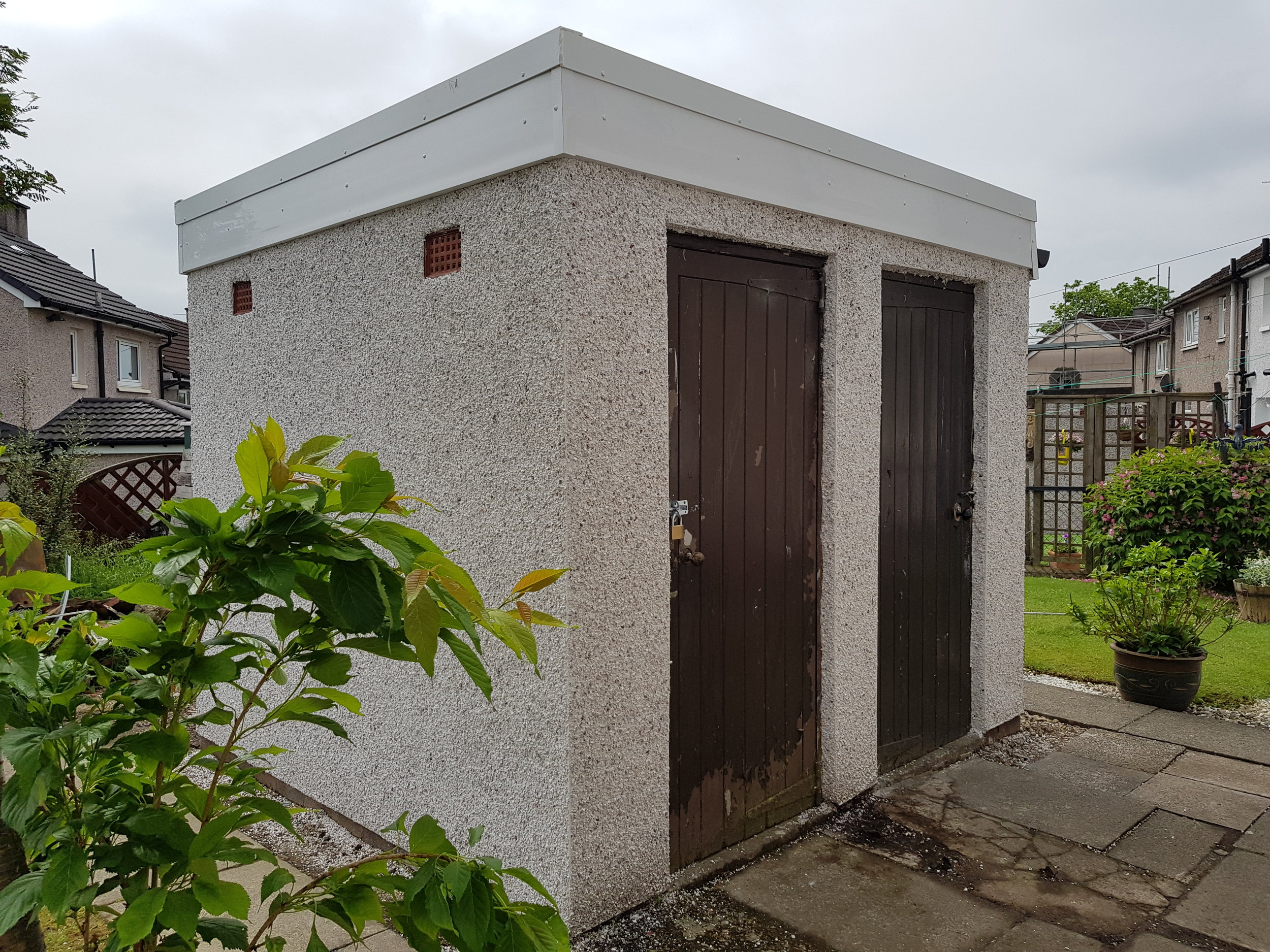 Small Outbuilding After Roughcast & Pvc.jpg