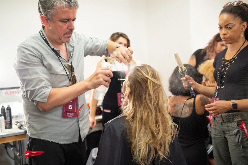 Nick Arrojo & Williamsburg stylist Arlene adding texture.