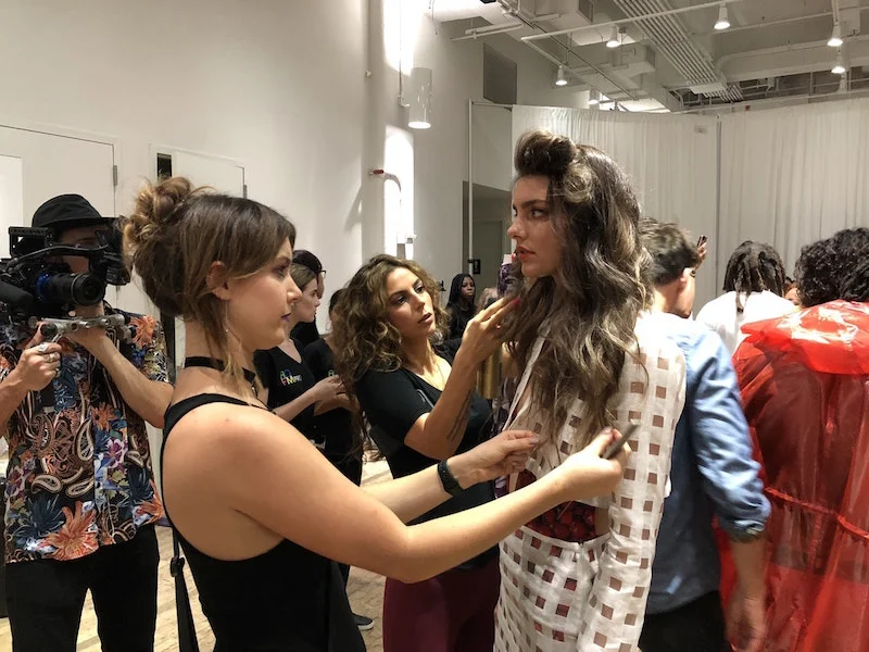 Stylists Katie & TaraMarie adding final touches before the Acid NYC show.