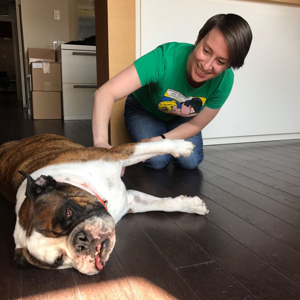 Michaud comforts her furry friend, Hank as she is trimming his nails // Image by MEAGHAN MICHAUD