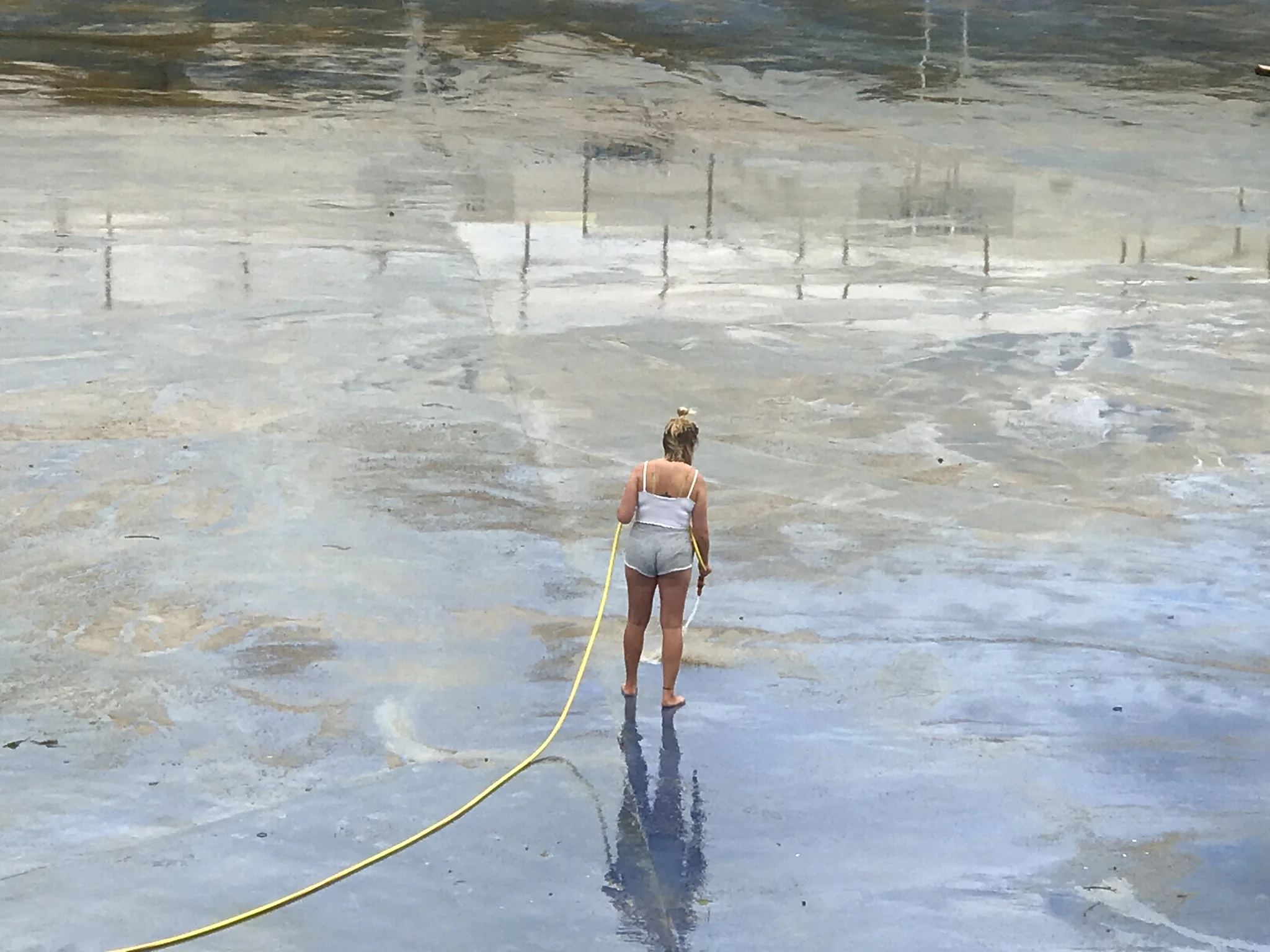 Cleaning the Jubilee Lido , Penzance