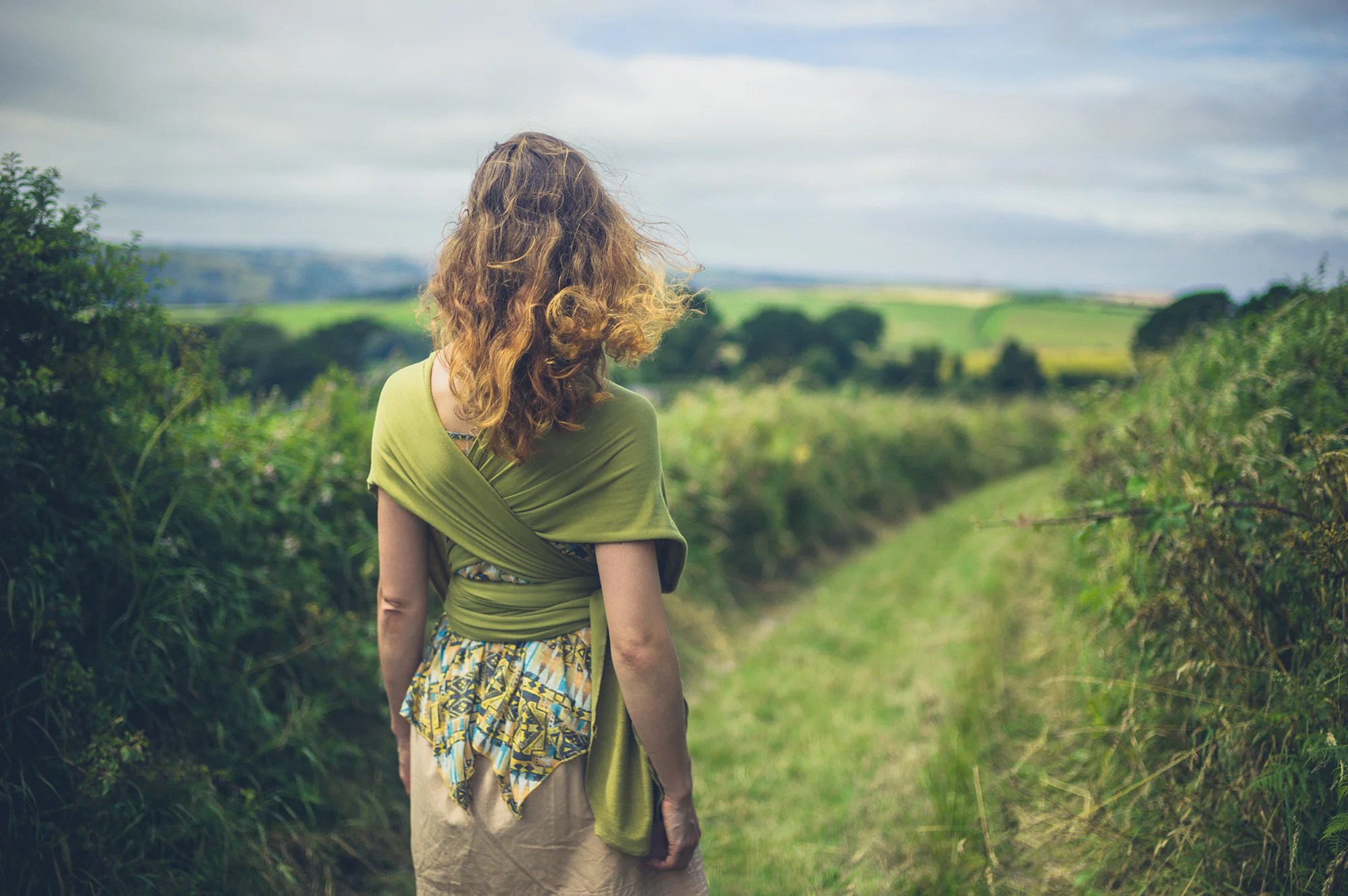woman-practising-mindfulness-in-a-field.jpg