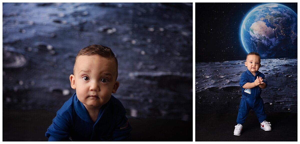 One year old boy on a moon backdrop.