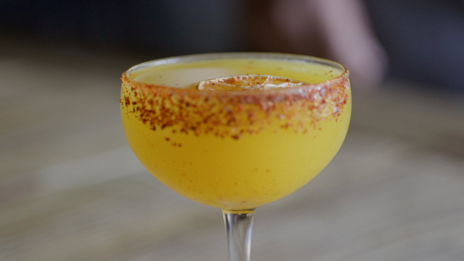 Bartender Ignacio Murillo makes a Golden Beet Cocktail at A.O.C.