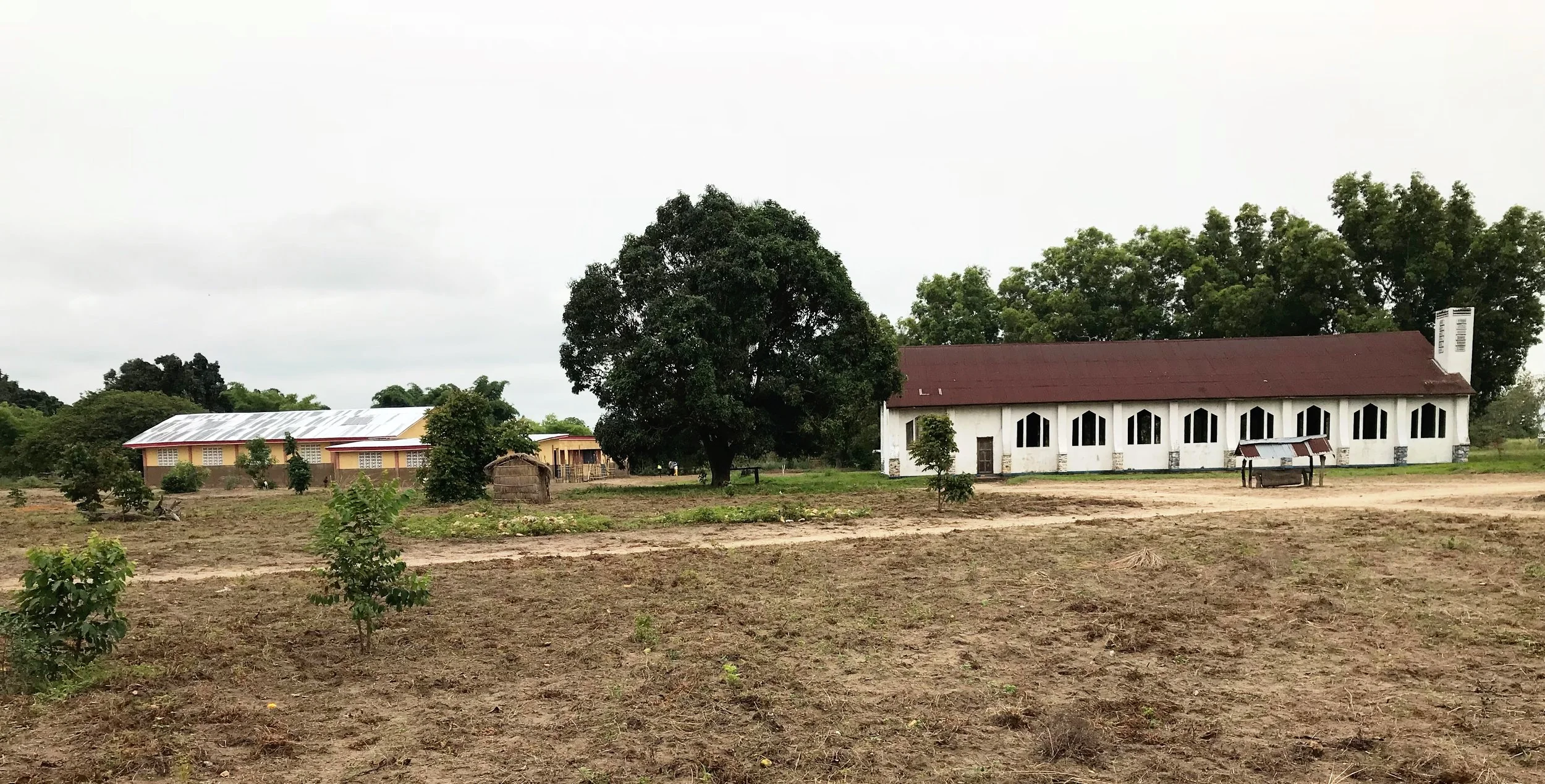 New multi-purpose center behind the church. Until 2018, the church, built in the 1960s, was the only gathering facility in Kandale.