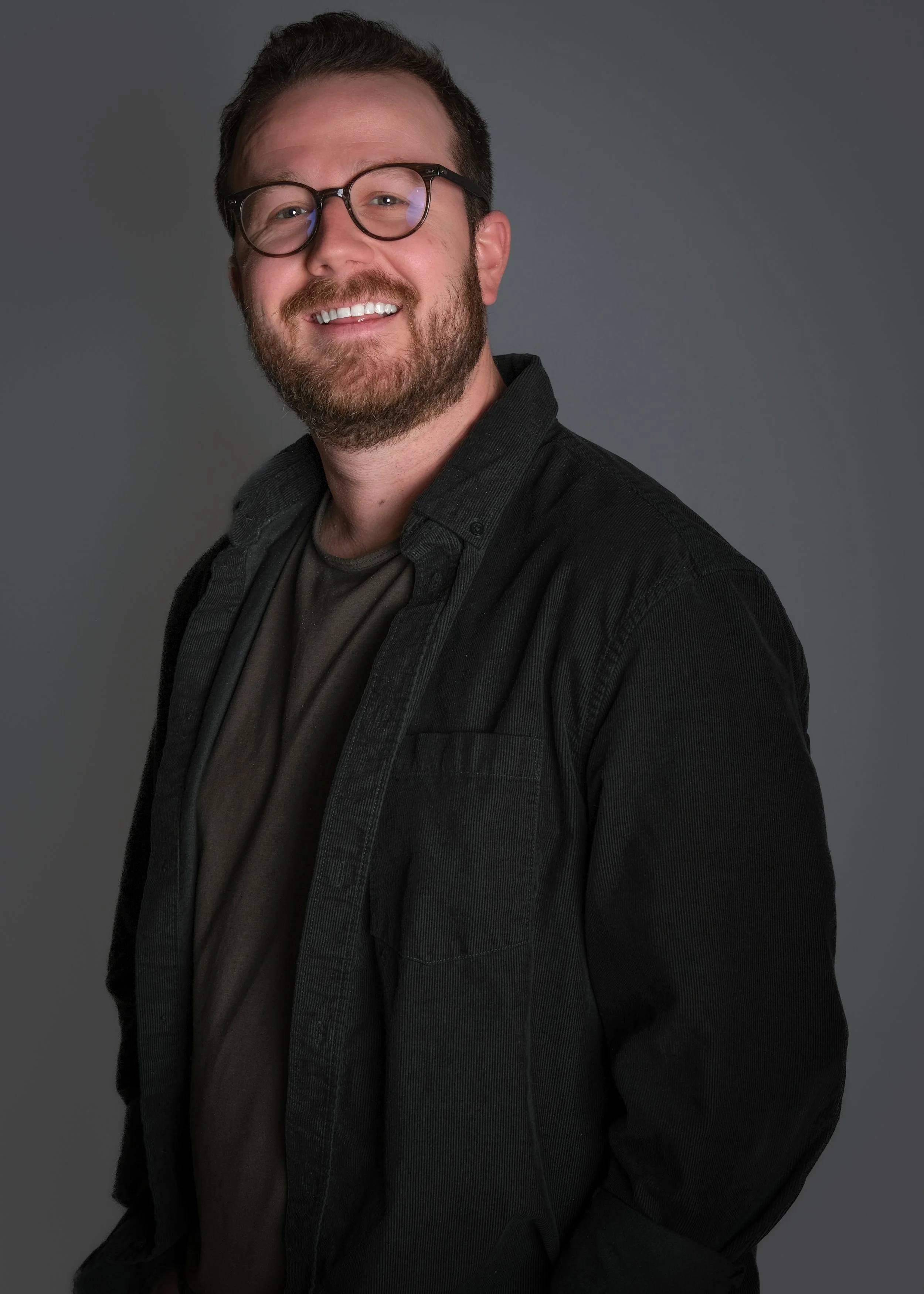 TC Courtney Solid_Headshot26-28.jpg