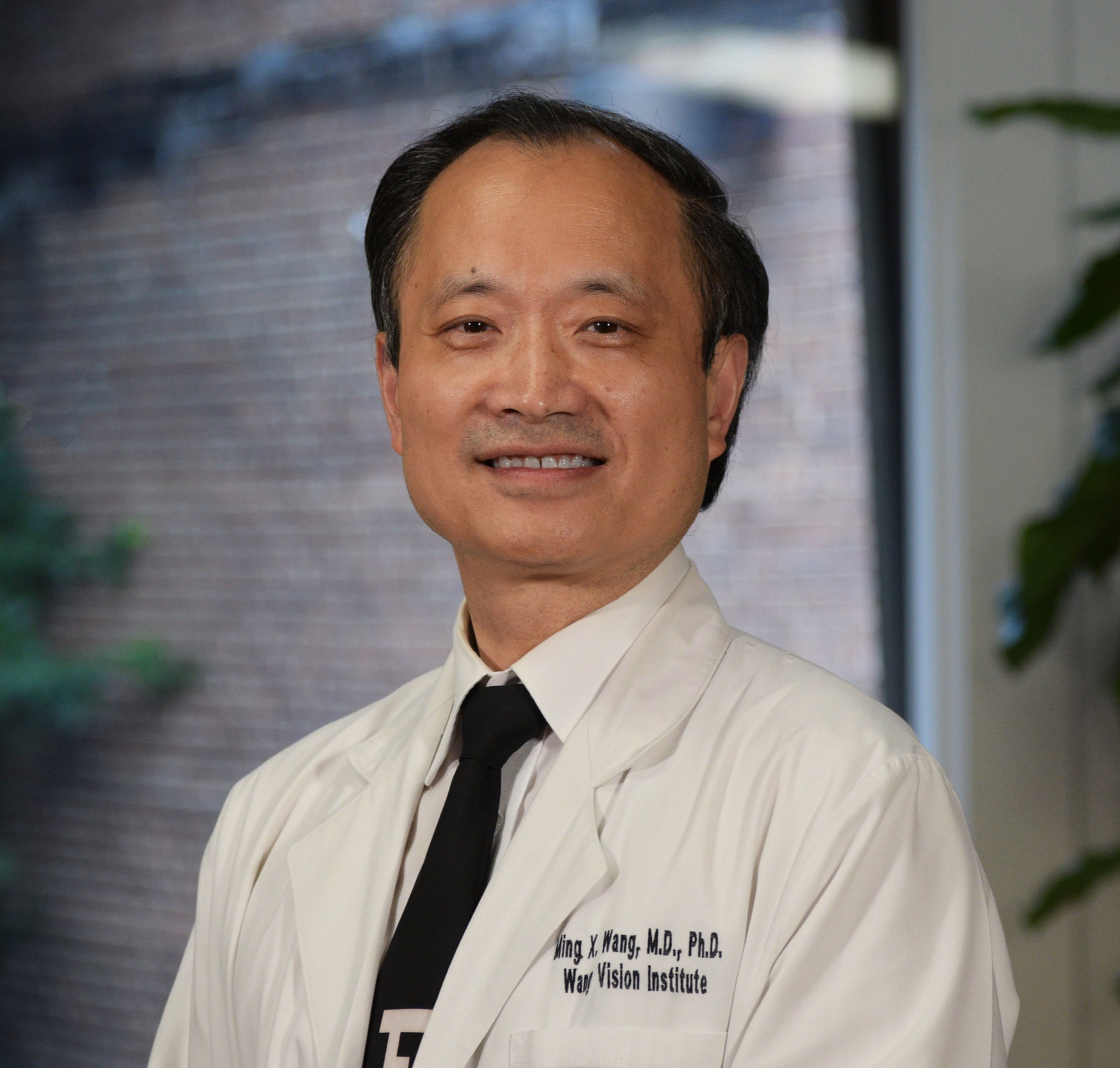 Dr+Wang+Head+Shot.jpg