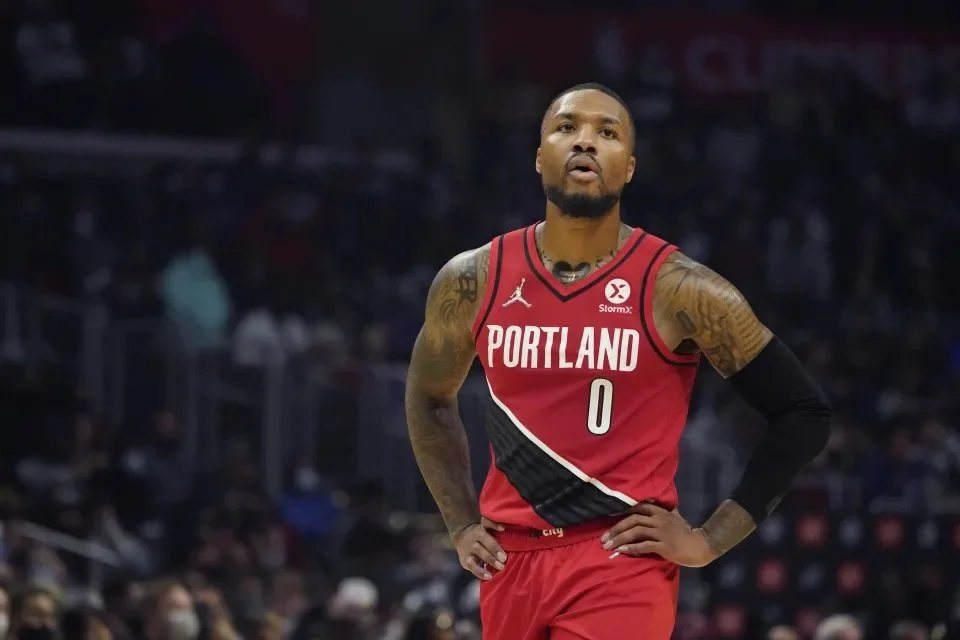 Report: Damian Lillard will report to training camp only in Miami or Portland