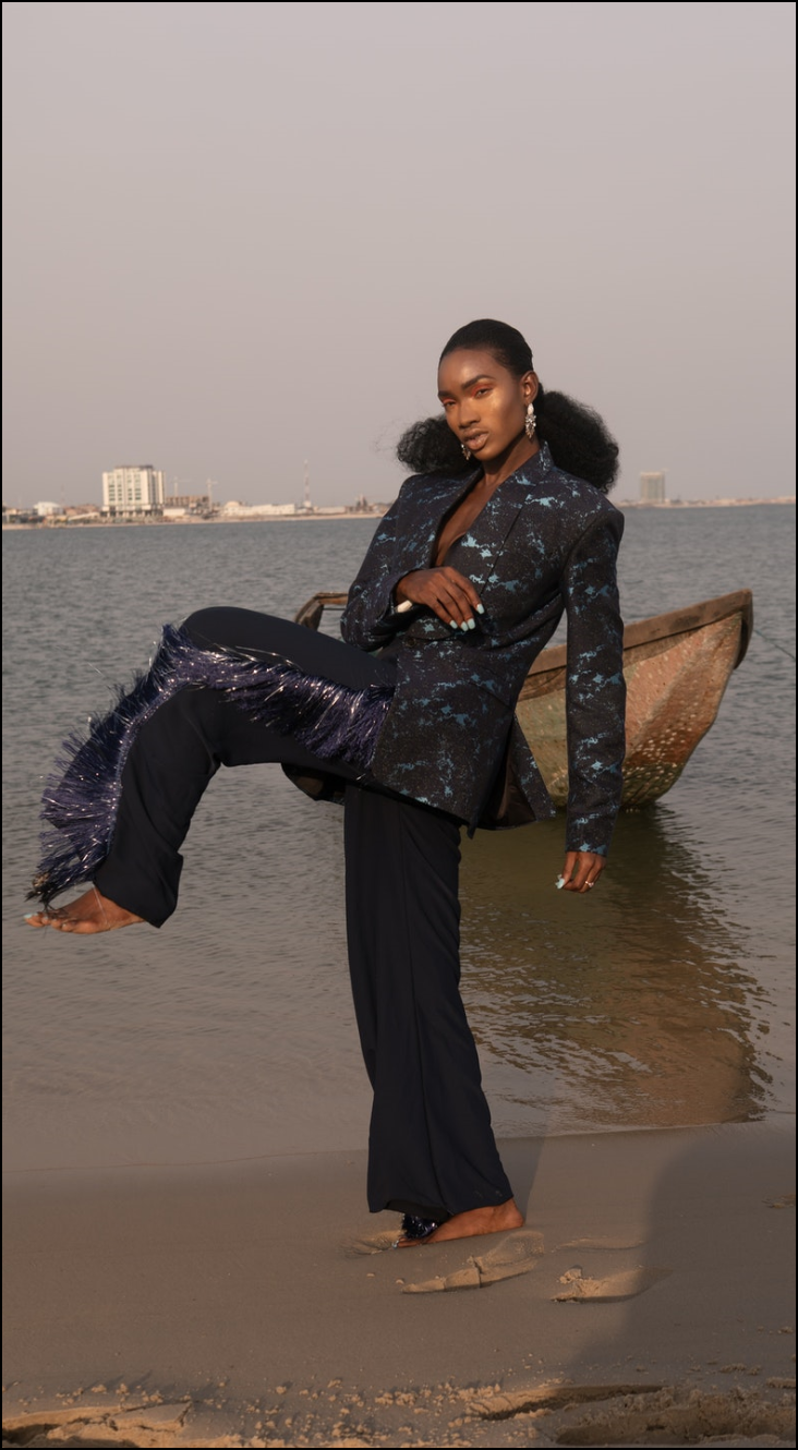 woman-at-beach-in-pantsuit