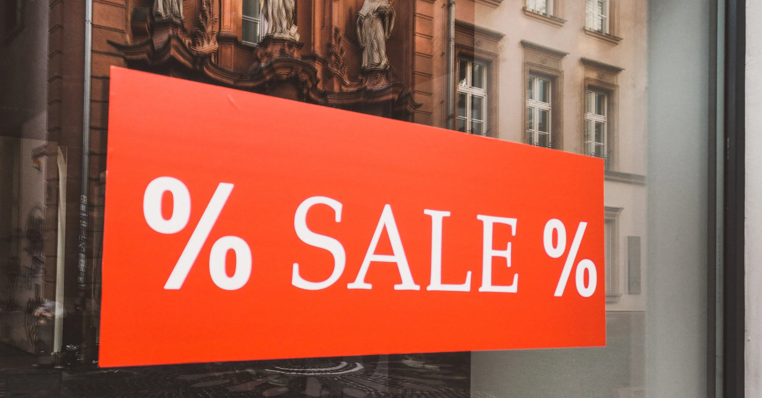 Picture of a temporary sale sign.
