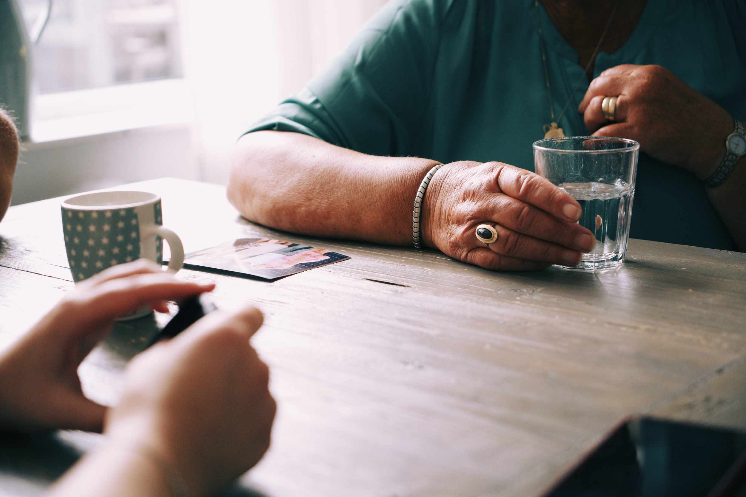 Picture of two people talking.