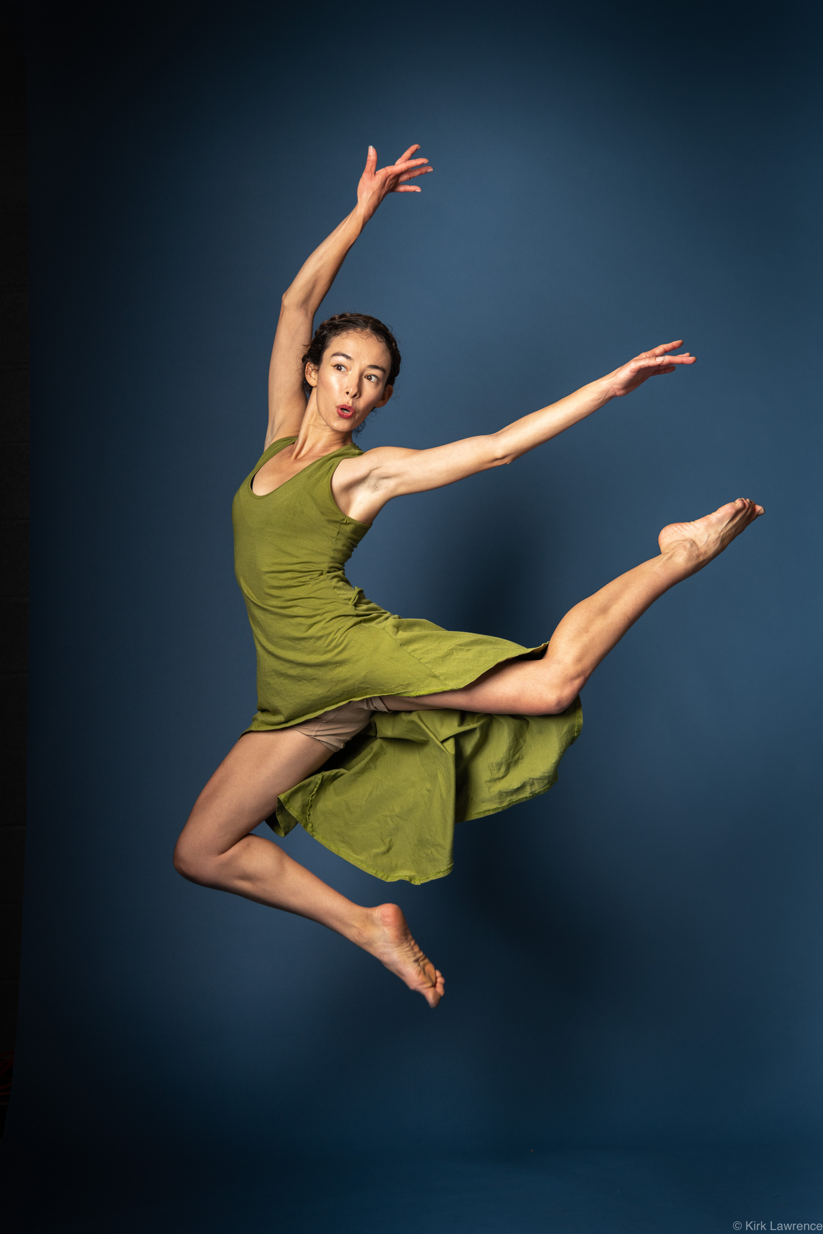 modern_dancer_jumping_green_dress.jpg