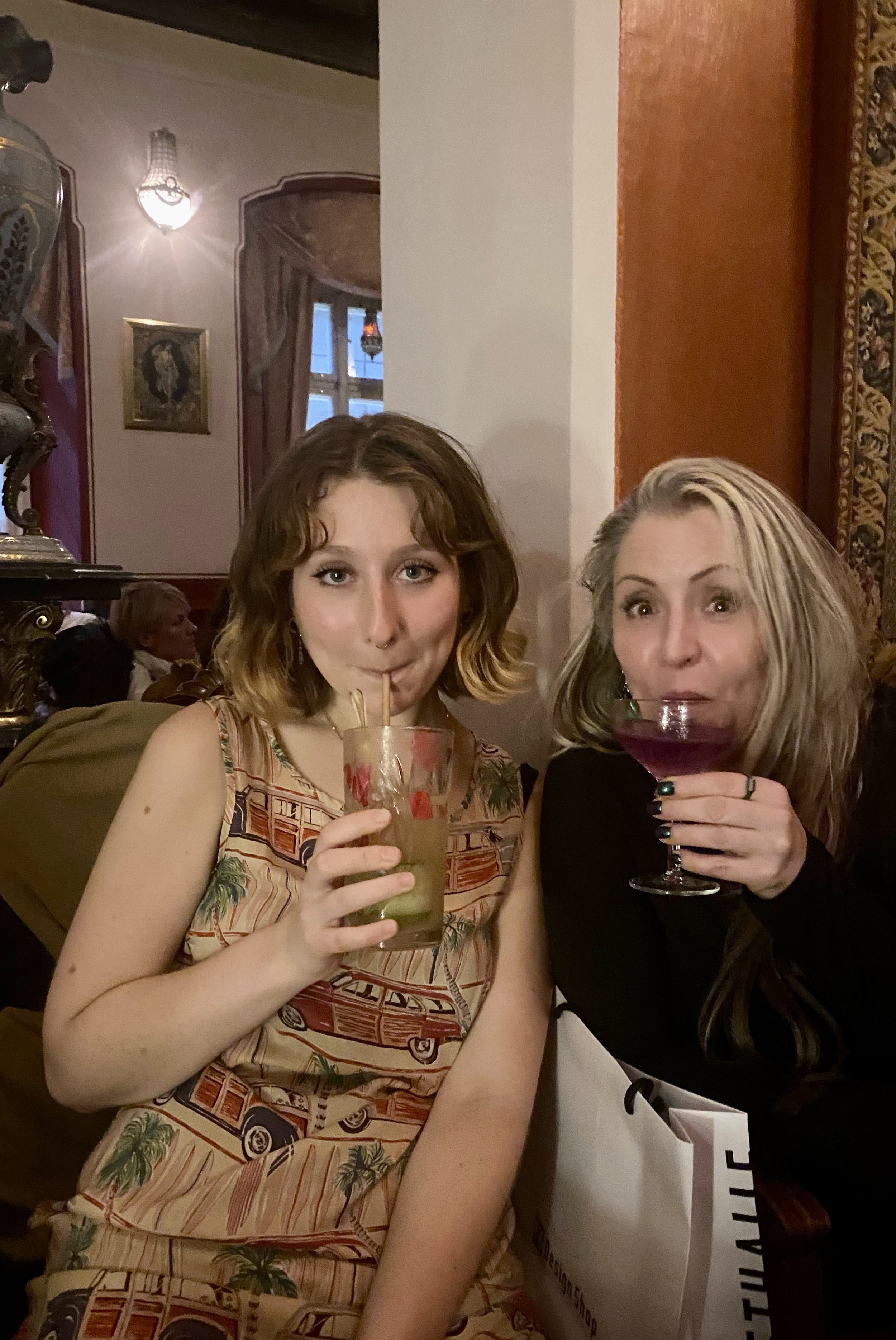 My daughter, Adison, and I sipping cocktails in Prague