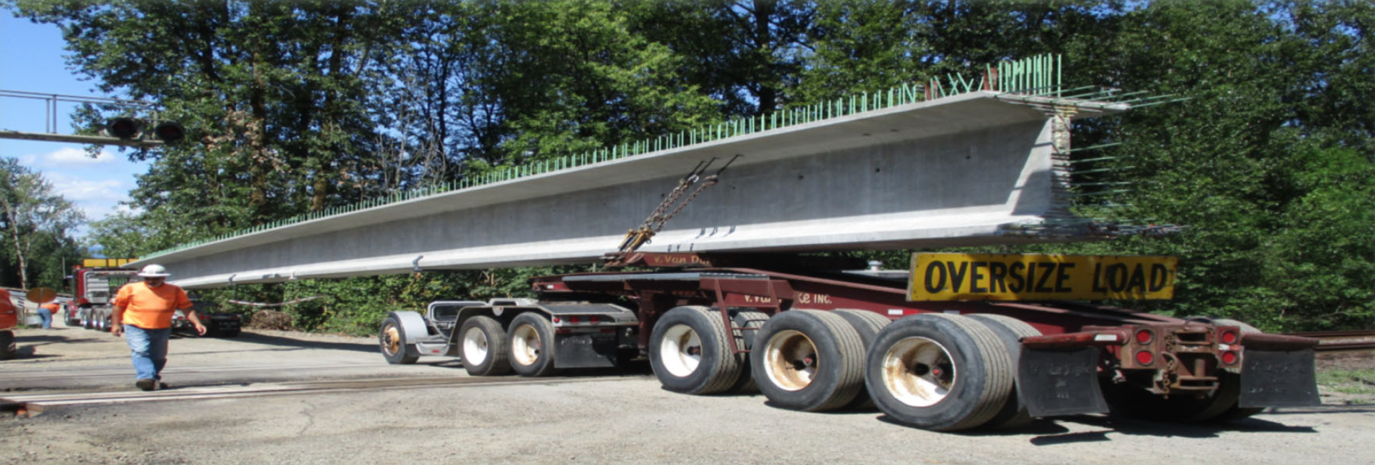 A steel girder being delivered to the River ‘S’ Bridge worksite.